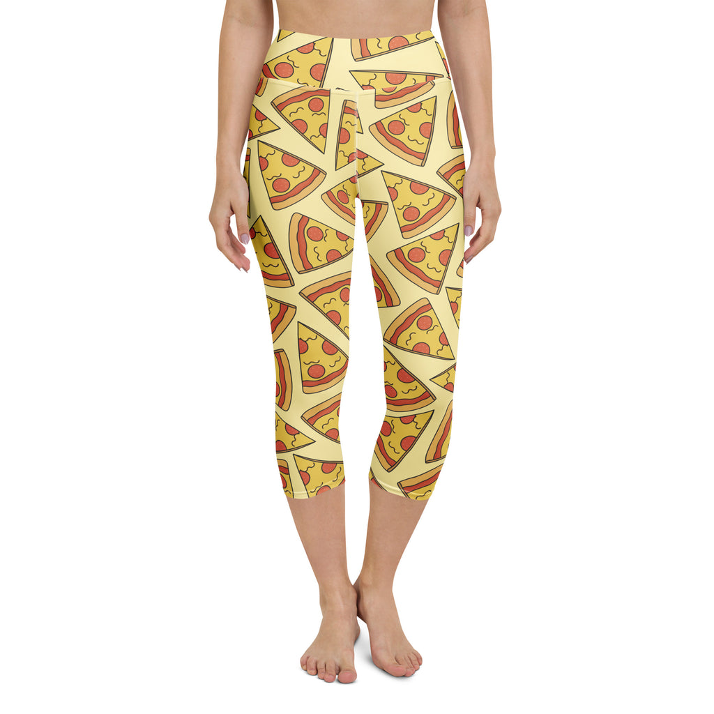 Yellow high-rise capri leggings with buttery soft fabric featuring a playful cartoon pizza slice pattern