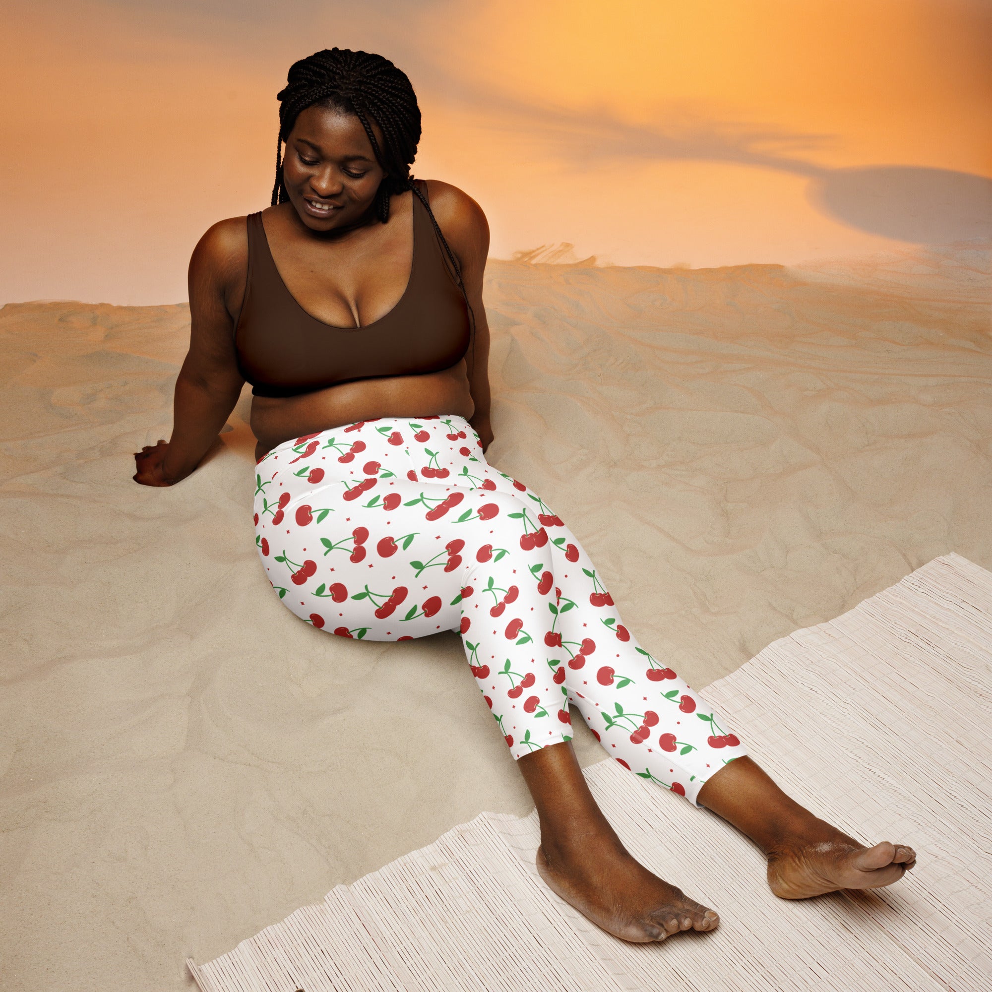 White cherry print buttery soft yoga capri leggings with snug fit stretchy fabric moisture-wicking material