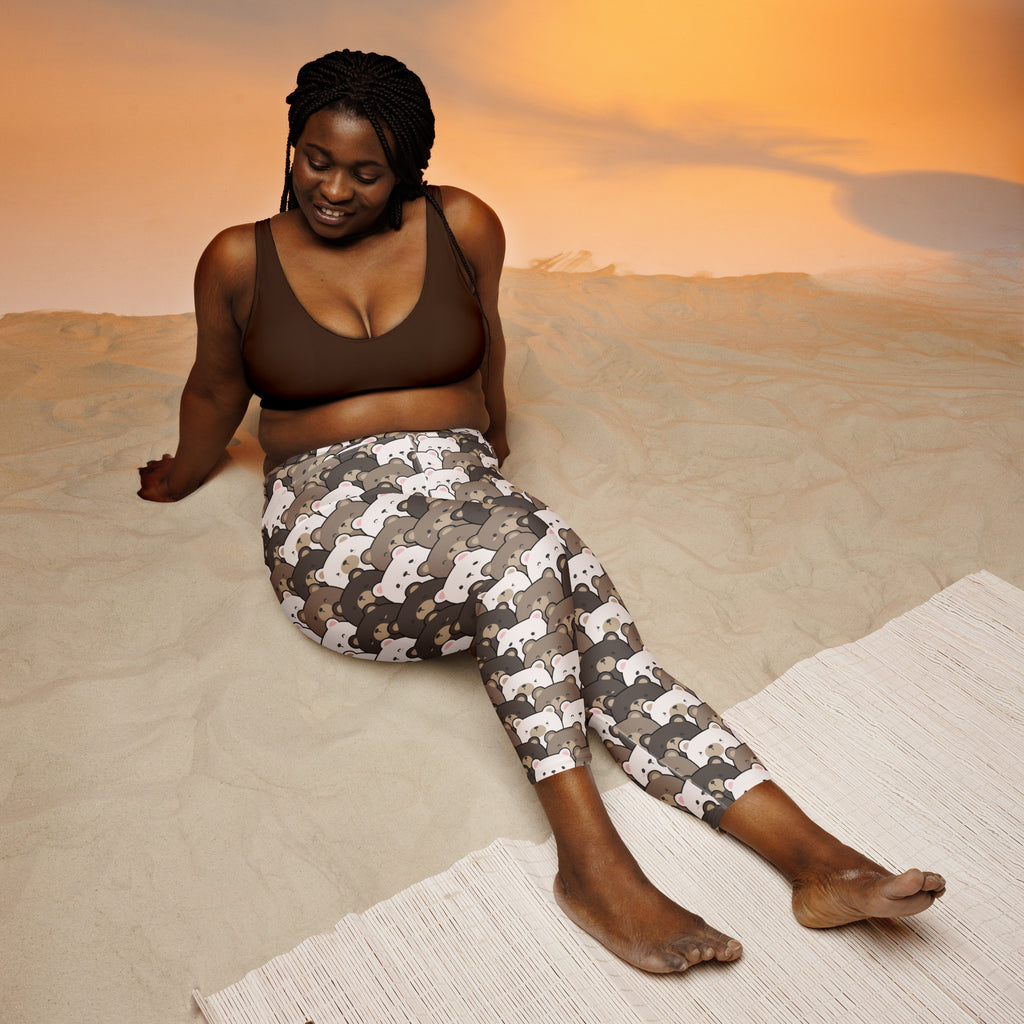 Women’s high-rise buttery soft brown and white yoga capri leggings with stylized game controller pattern and moisture-wicking fabric
