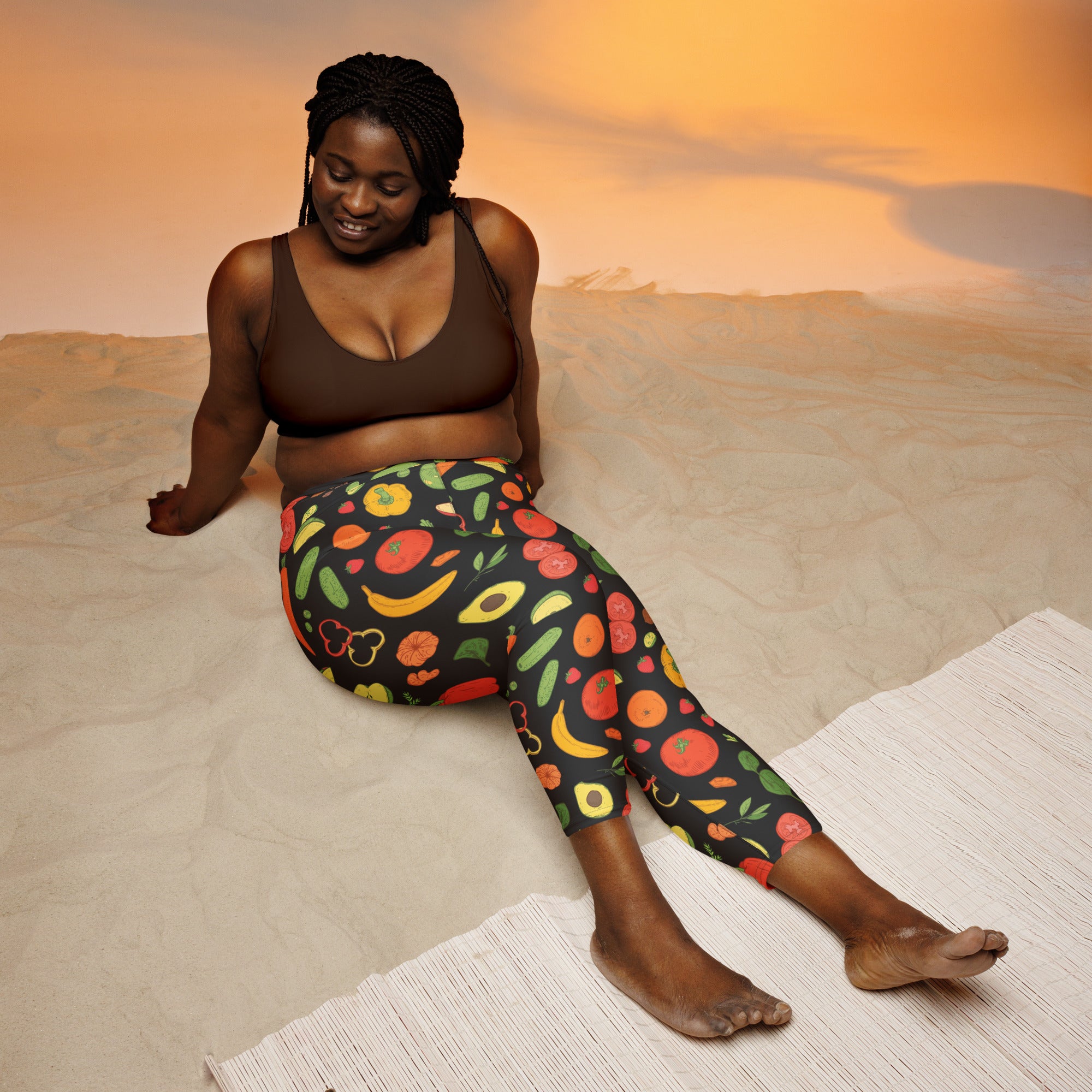 Women’s high-rise black yoga capri leggings with vibrant fruit and vegetable print buttery soft moisture-wicking fabric