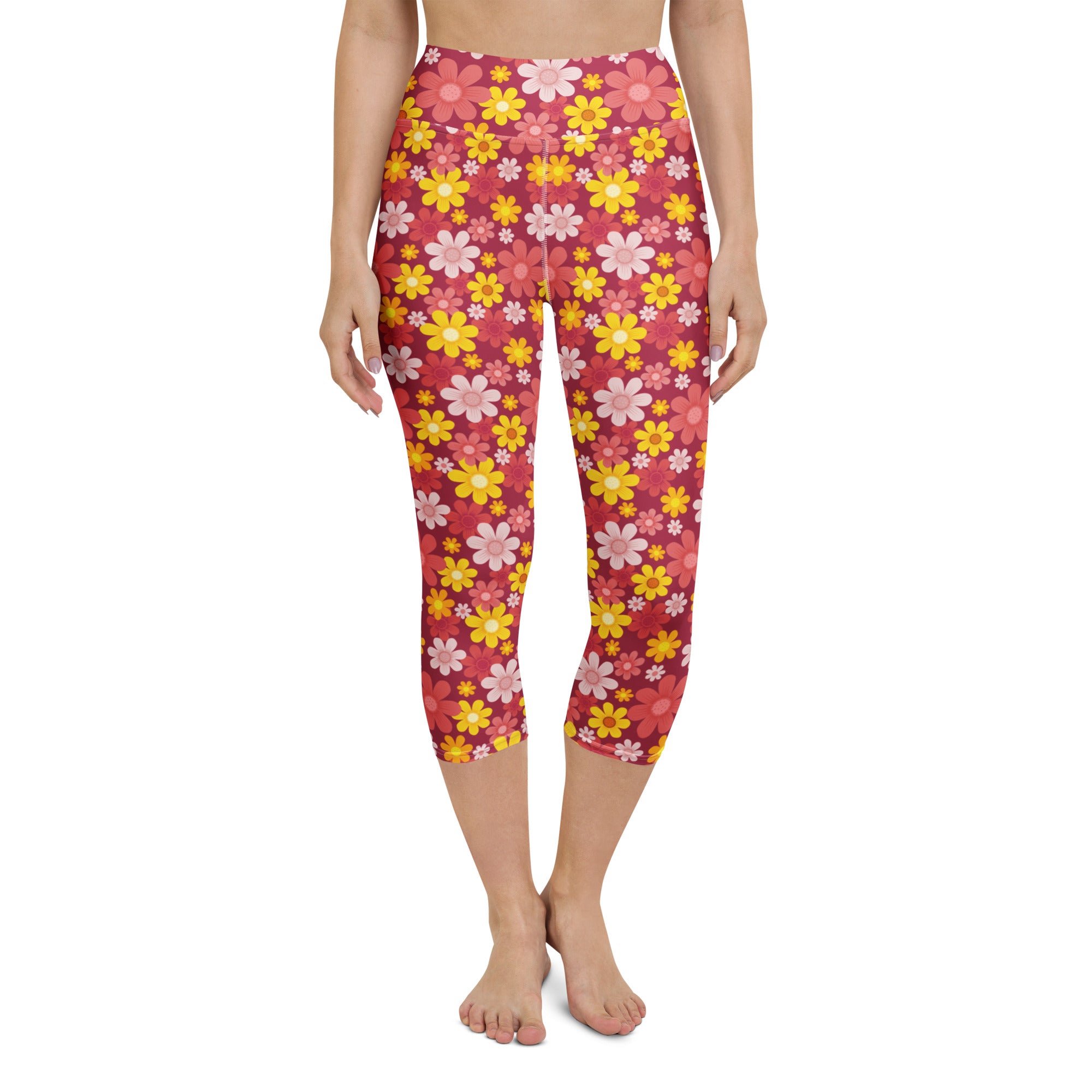 Women’s red floral buttery soft high-rise yoga capri leggings with vibrant pink yellow and white floral pattern