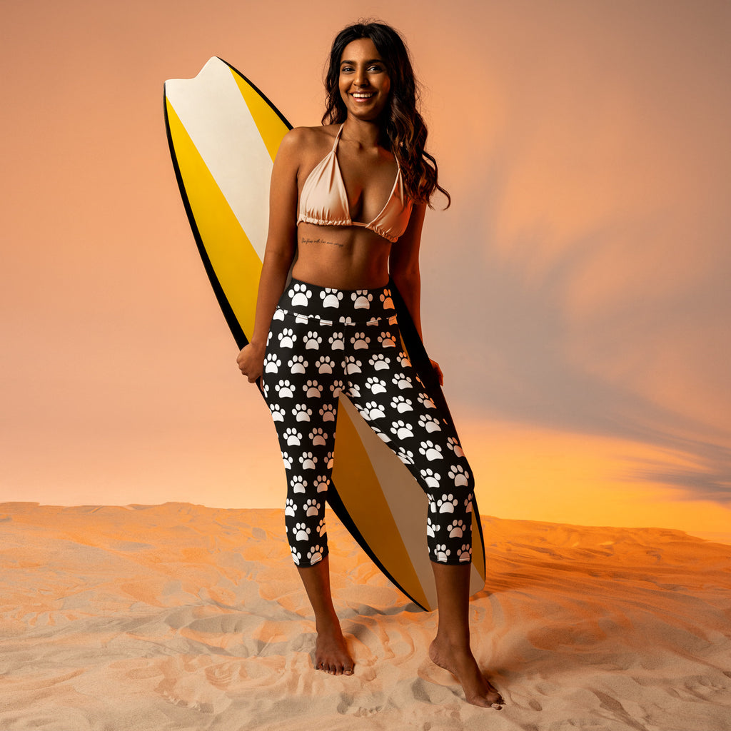 Women’s black high-rise paw print buttery soft yoga capri leggings with moisture-wicking soft stretch fabric