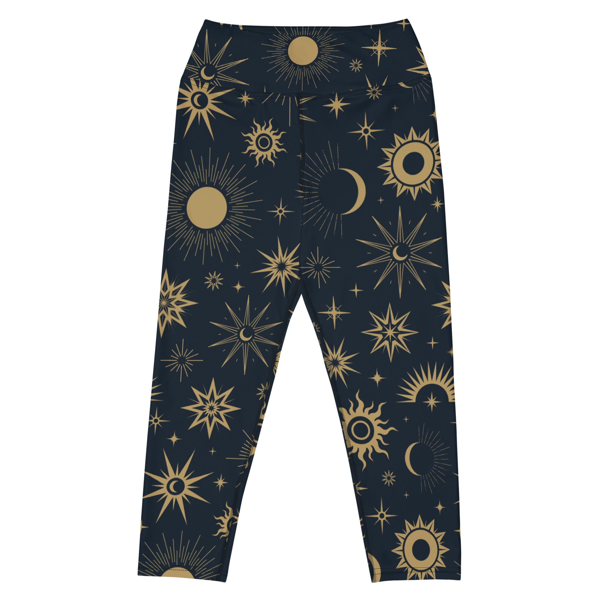 Dark blue buttery soft high-rise yoga capri leggings with celestial gold suns moons and stars pattern for activewear