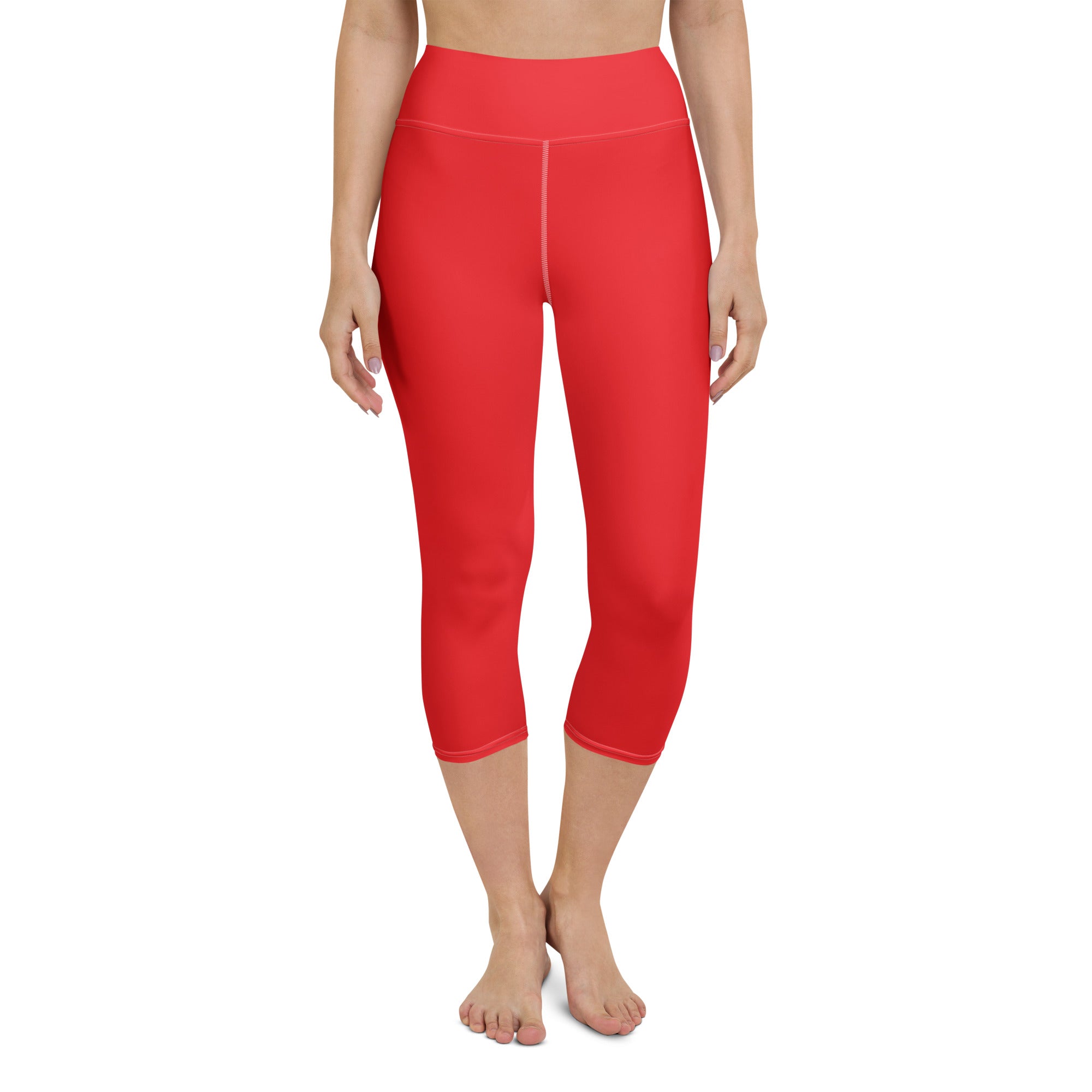 Bright red high-rise capri leggings made of buttery soft stretchy fabric moisture-wicking for yoga and activewear