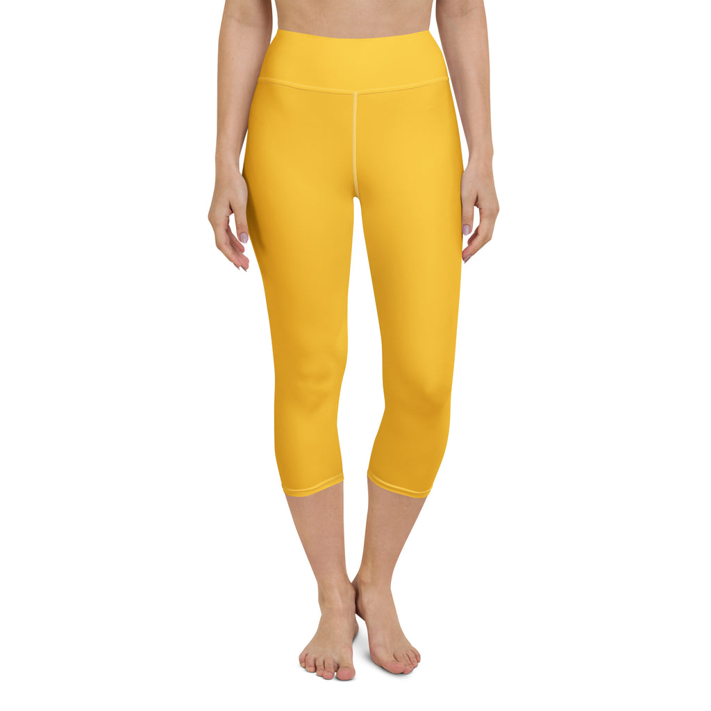 Women’s bright yellow buttery soft high-rise seamless yoga capri leggings with moisture-wicking stretch fabric