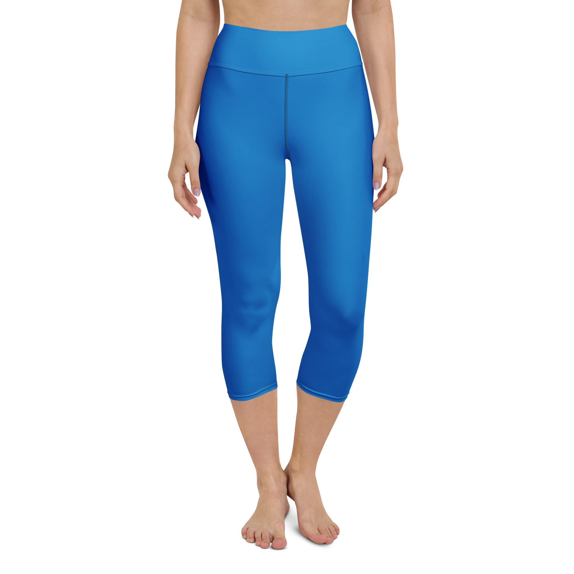 Bright blue high-waisted buttery soft yoga capri leggings with moisture-wicking and soft stretch fabric