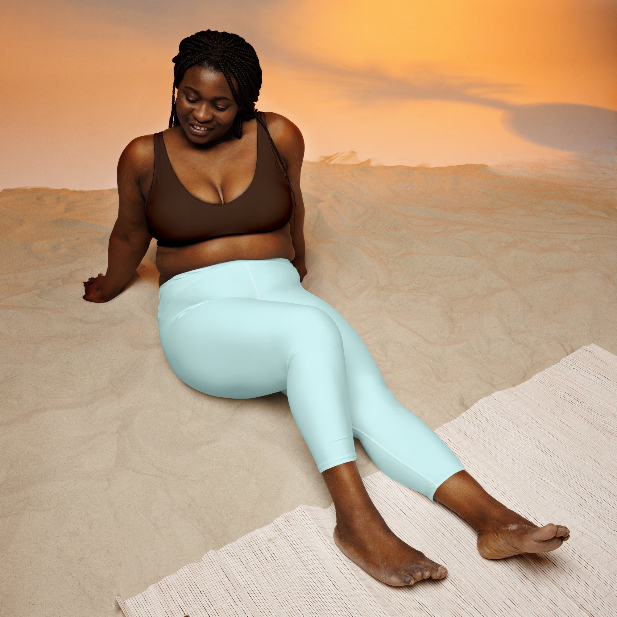 Light blue high-rise buttery soft yoga capri leggings with moisture-wicking stretch for women activewear
