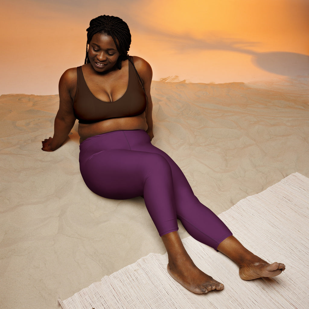 Women’s plum purple high-rise capri leggings made of buttery soft moisture-wicking stretch fabric for yoga and activewear