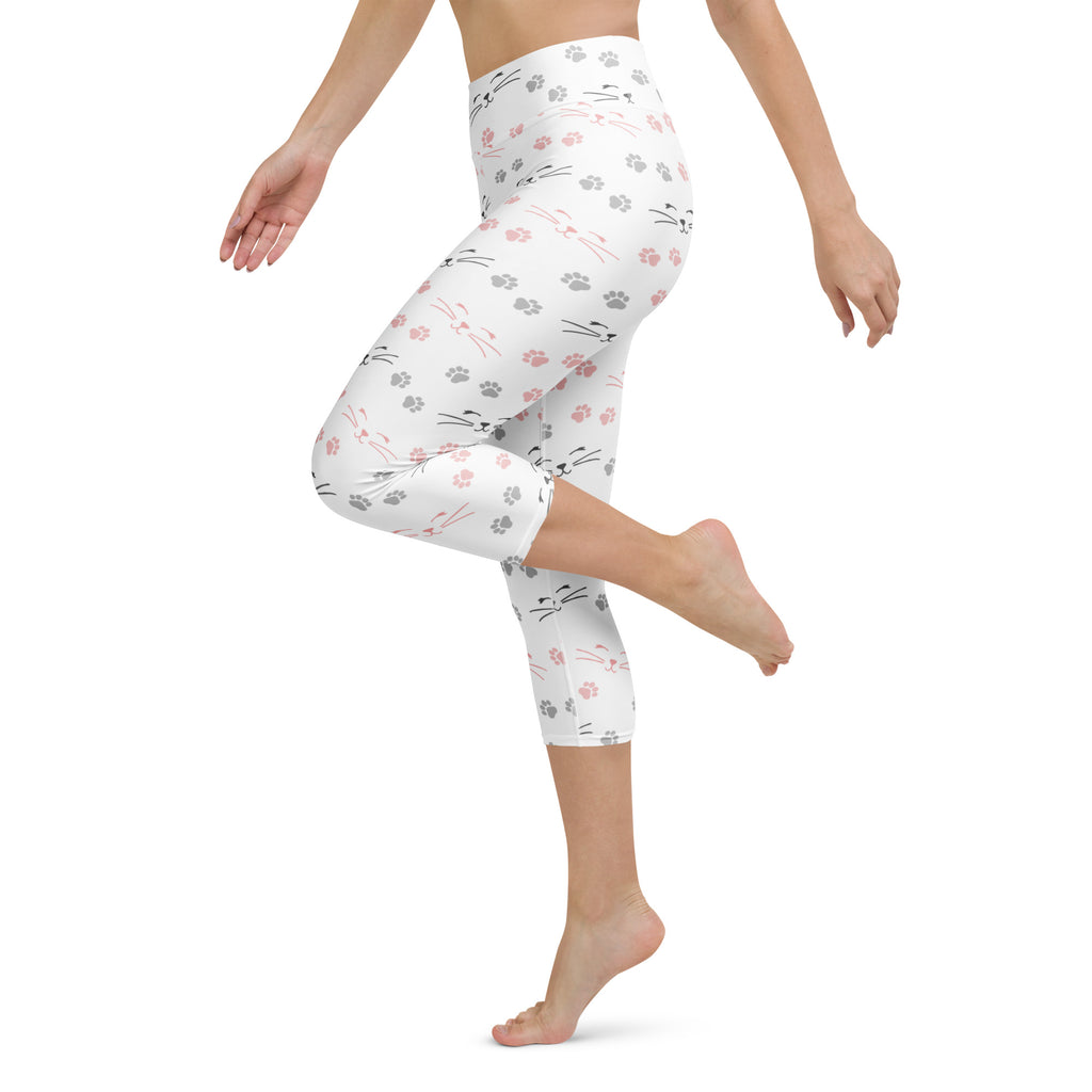 White capri leggings with pink and gray cat faces whiskers and paw prints buttery soft high-rise yoga activewear