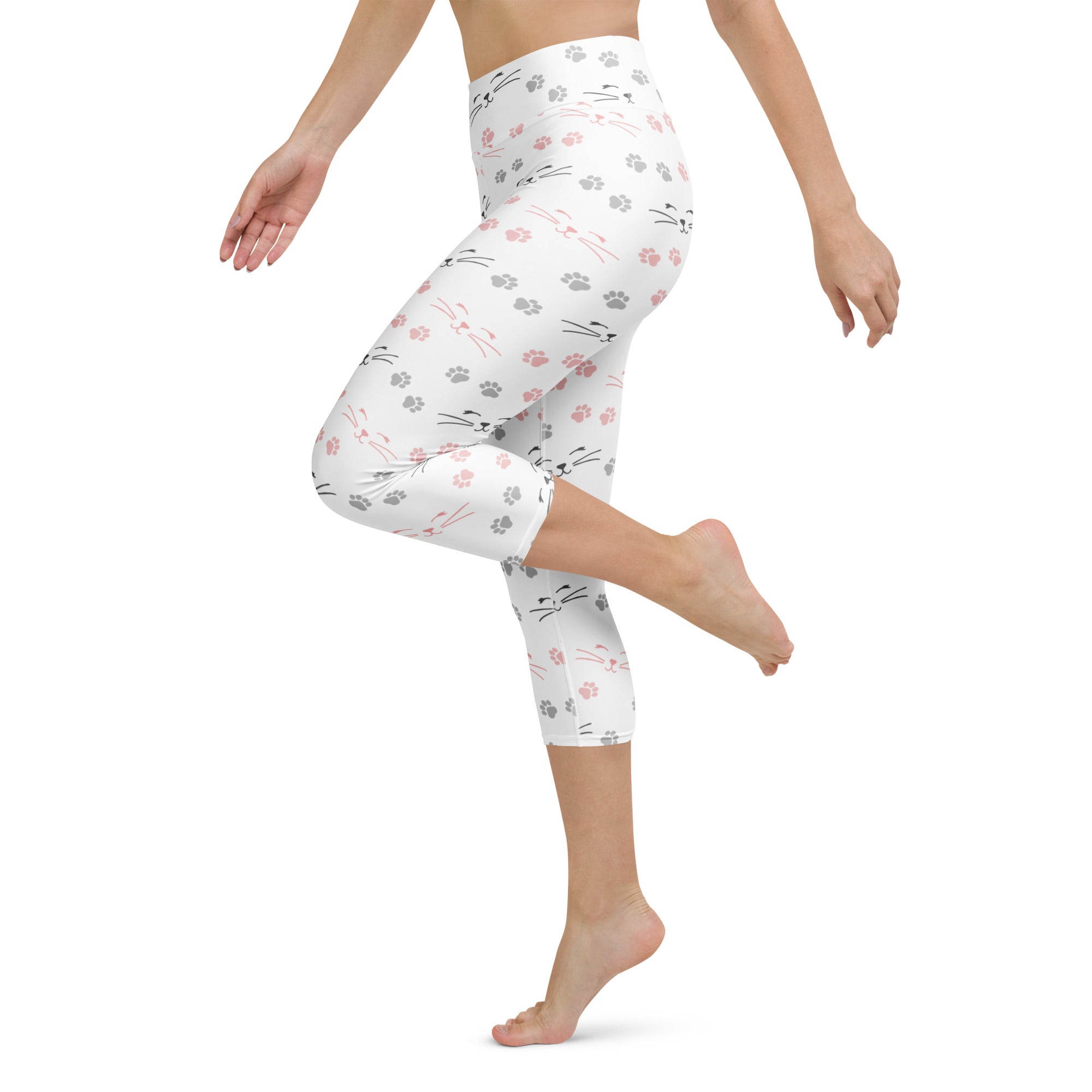 White capri leggings with pink and gray cat faces whiskers and paw prints buttery soft high-rise yoga activewear