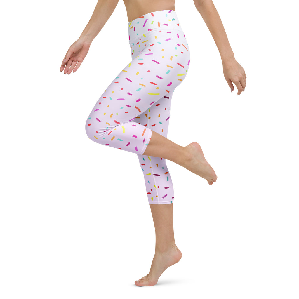 White capri leggings with multicolored sprinkles featuring buttery soft fabric high rise and moisture wicking design