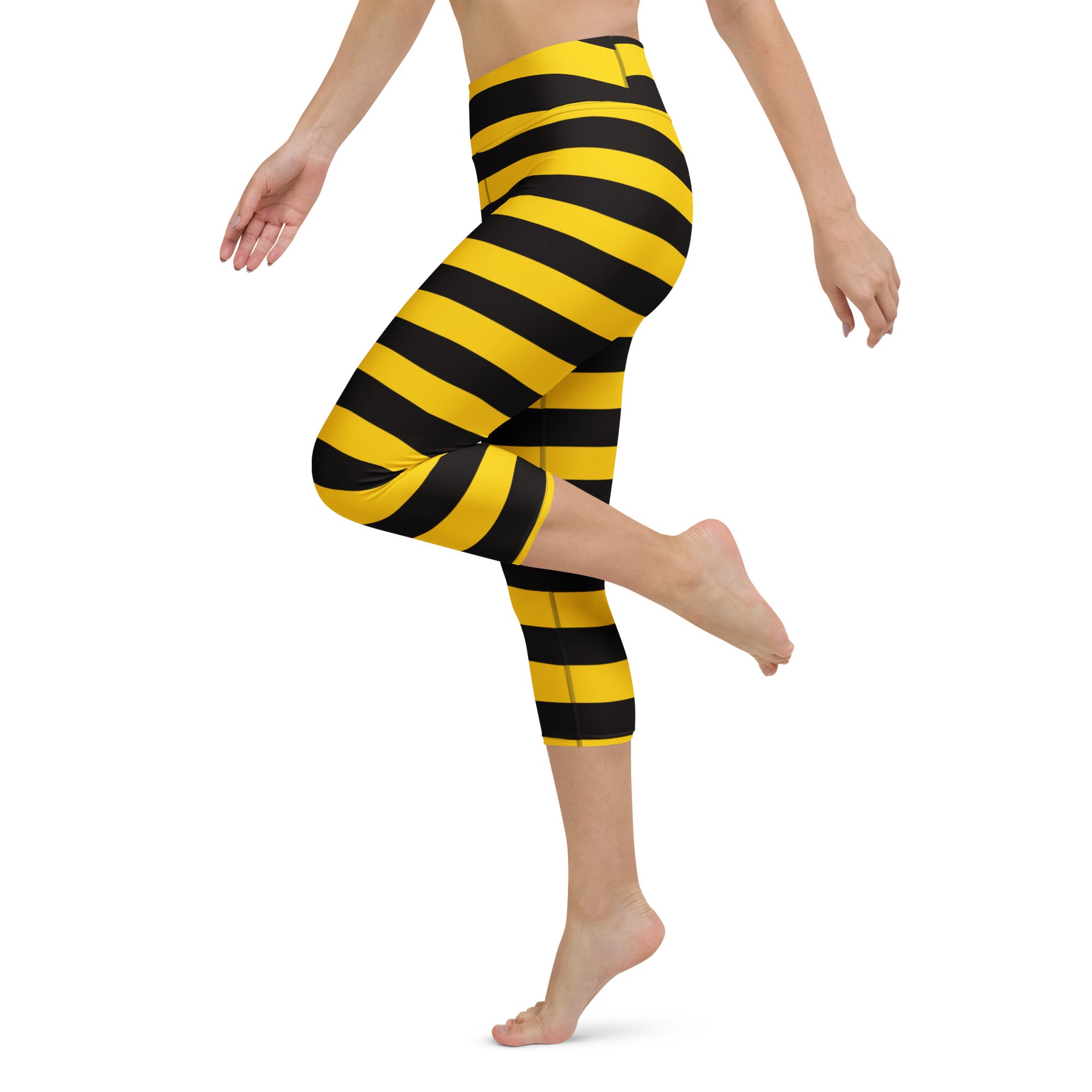 Women’s bumblebee stripe buttery soft high-rise yoga capri leggings in bright yellow and black with moisture-wicking stretch