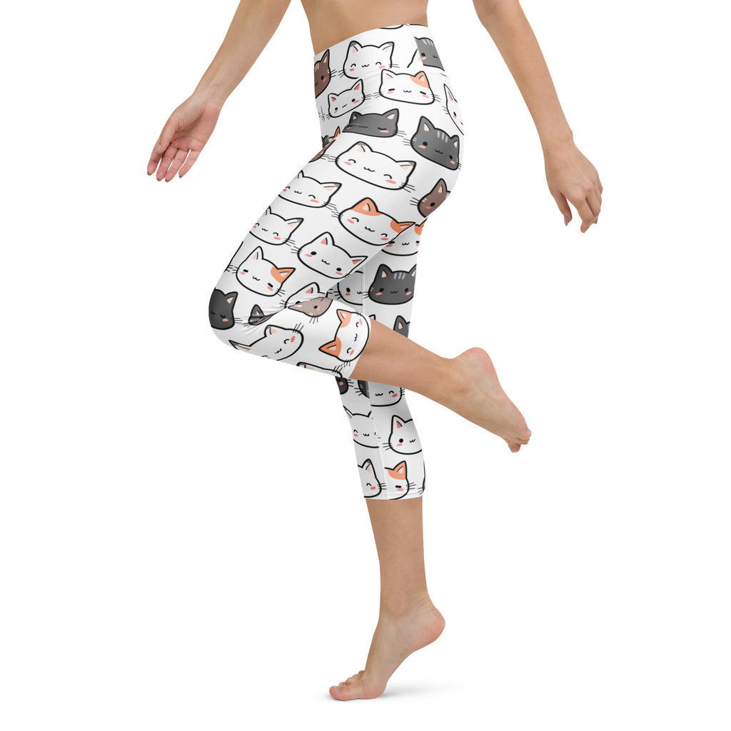 White high-rise capri leggings with colorful cartoon cats made of buttery soft moisture-wicking fabric for yoga