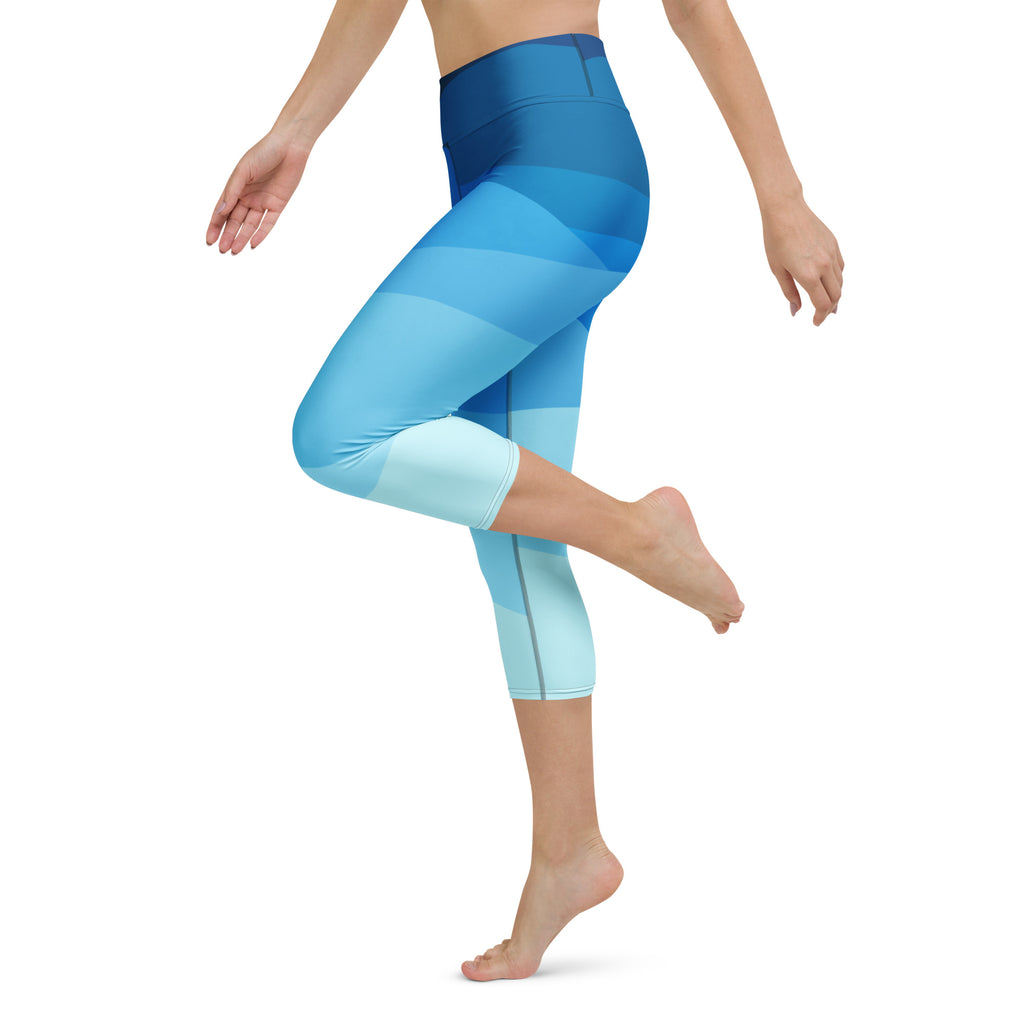 Women’s wavy blue high-rise capri leggings with buttery soft stretchy fabric and subtle side seam detailing