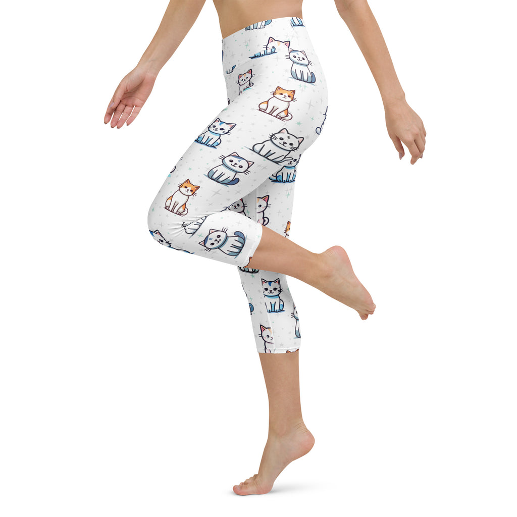 White capri leggings with playful orange blue and gray cartoon cat print buttery soft high-rise moisture-wicking activewear