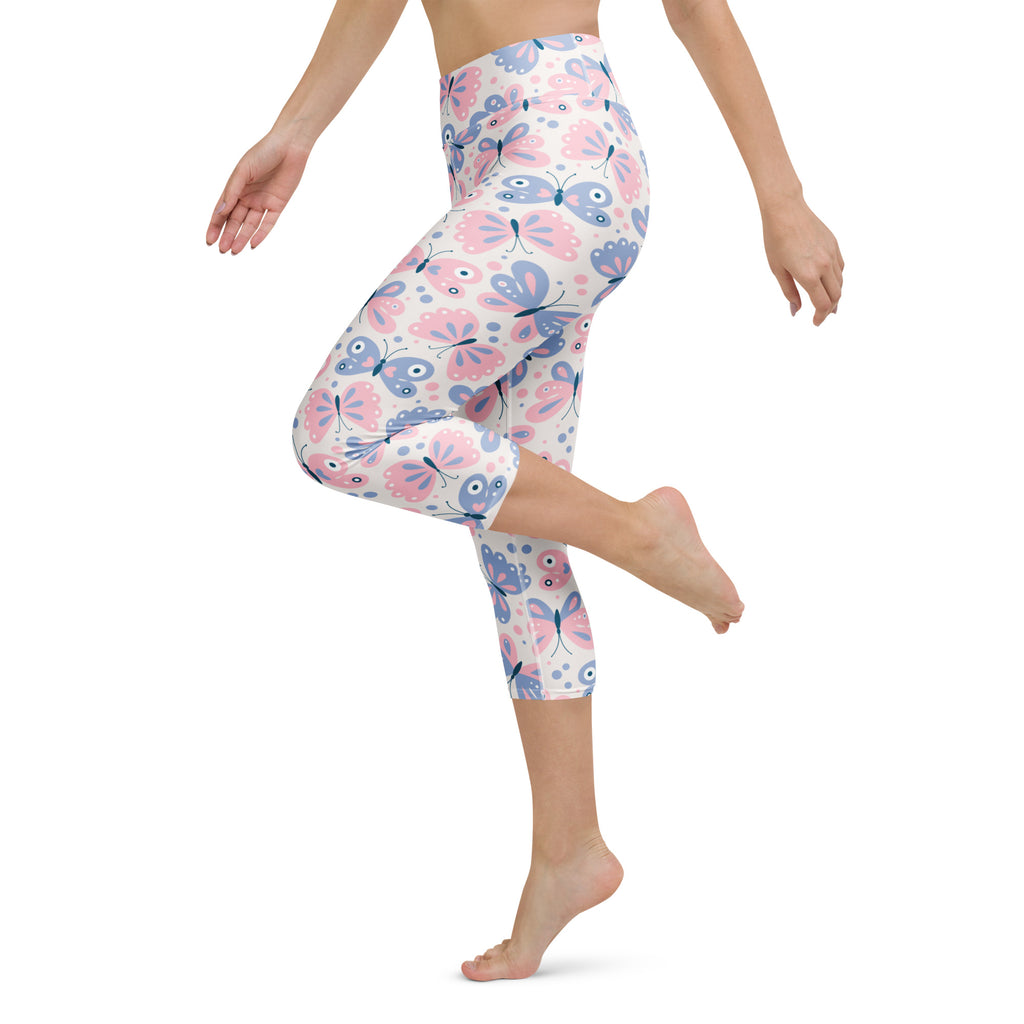 Women’s pastel butterfly buttery soft high-rise yoga capri leggings in pink and blue with moisture-wicking stretch