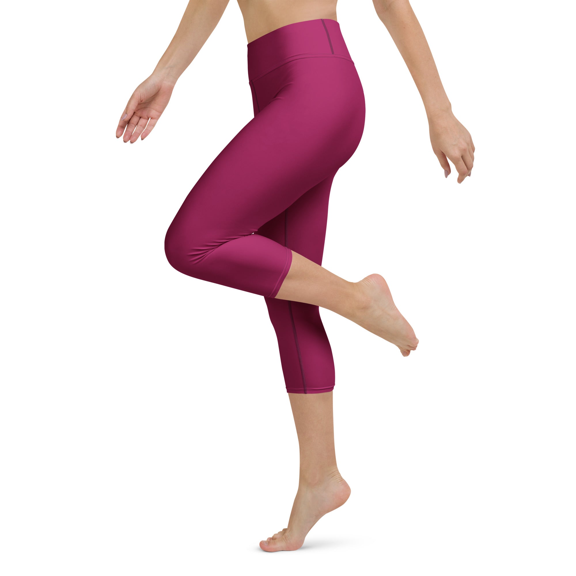 Women’s burgundy buttery soft high-rise yoga capri leggings in fuchsia smooth stretchy moisture-wicking fabric