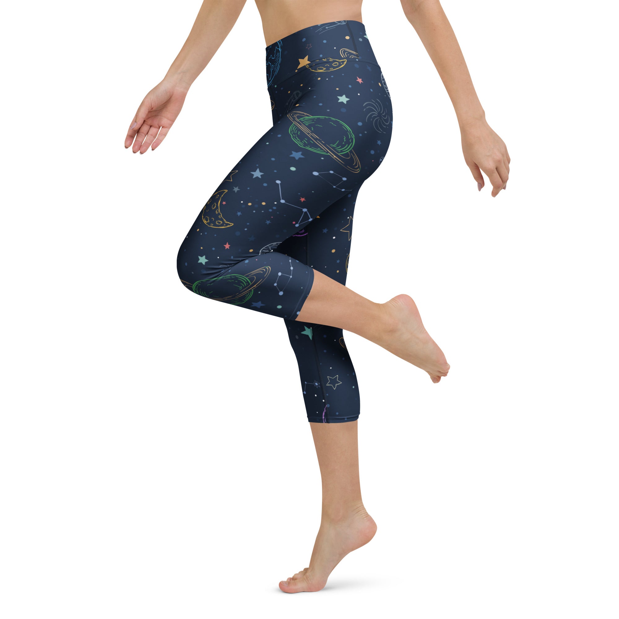 Dark blue capri leggings with whimsical pastel space print high rise buttery soft moisture wicking yoga pants