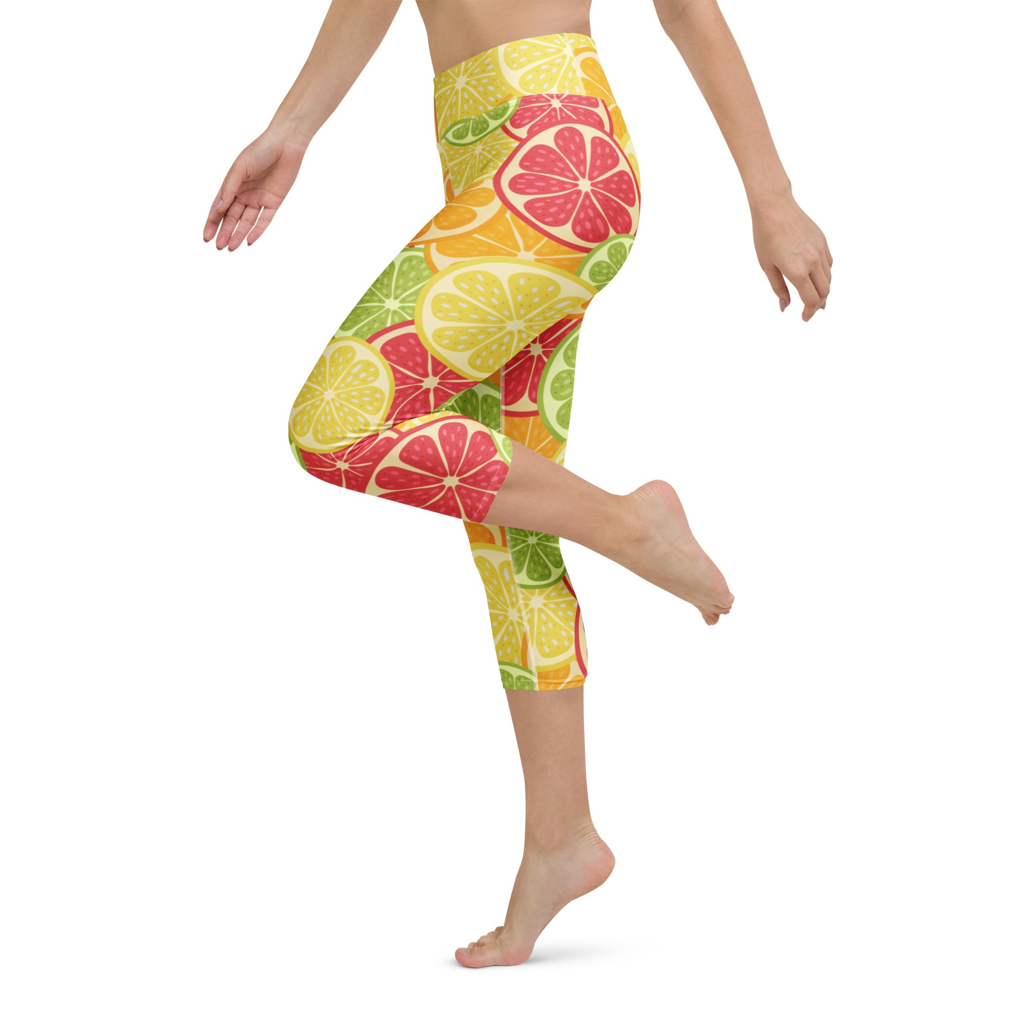 Women’s citrus fruit slices buttery soft high-rise yoga capri leggings with vibrant yellow green and red pattern