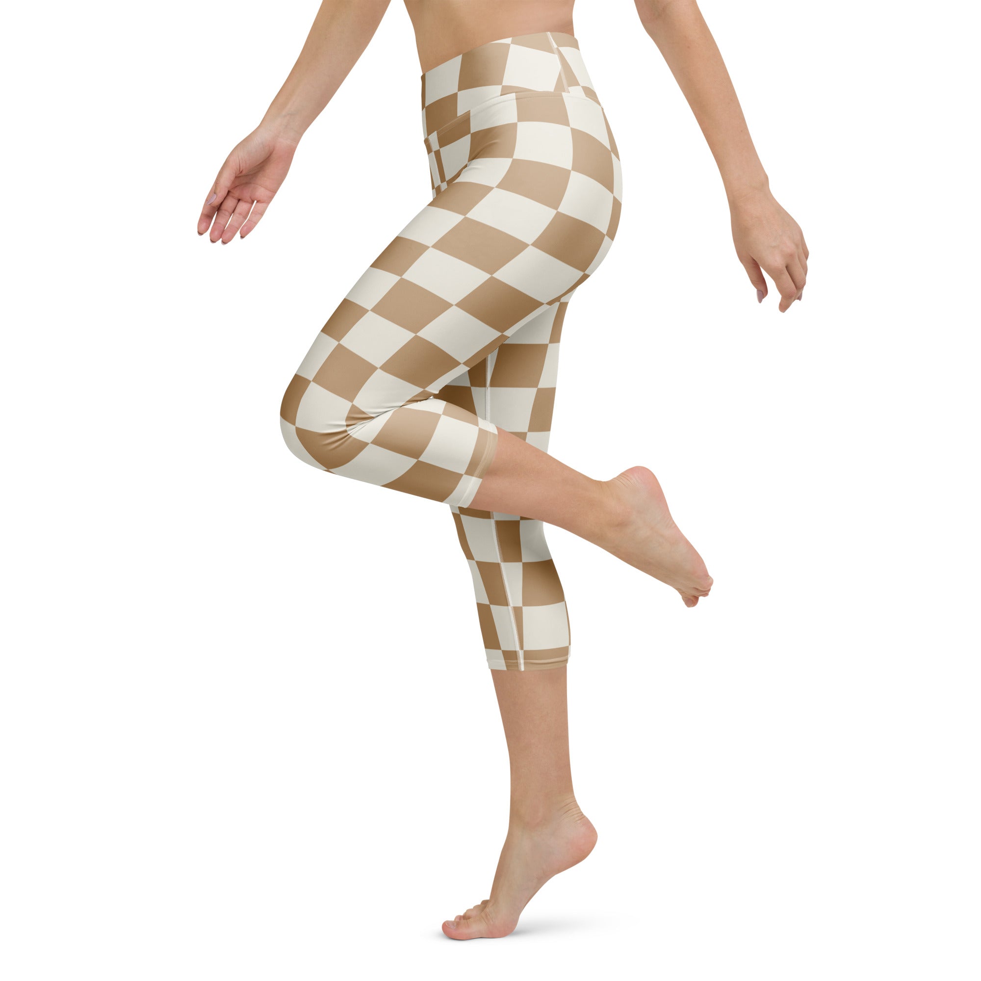 Women’s tan and white checkered buttery soft yoga capri leggings with high-rise waist and moisture-wicking stretch fabric