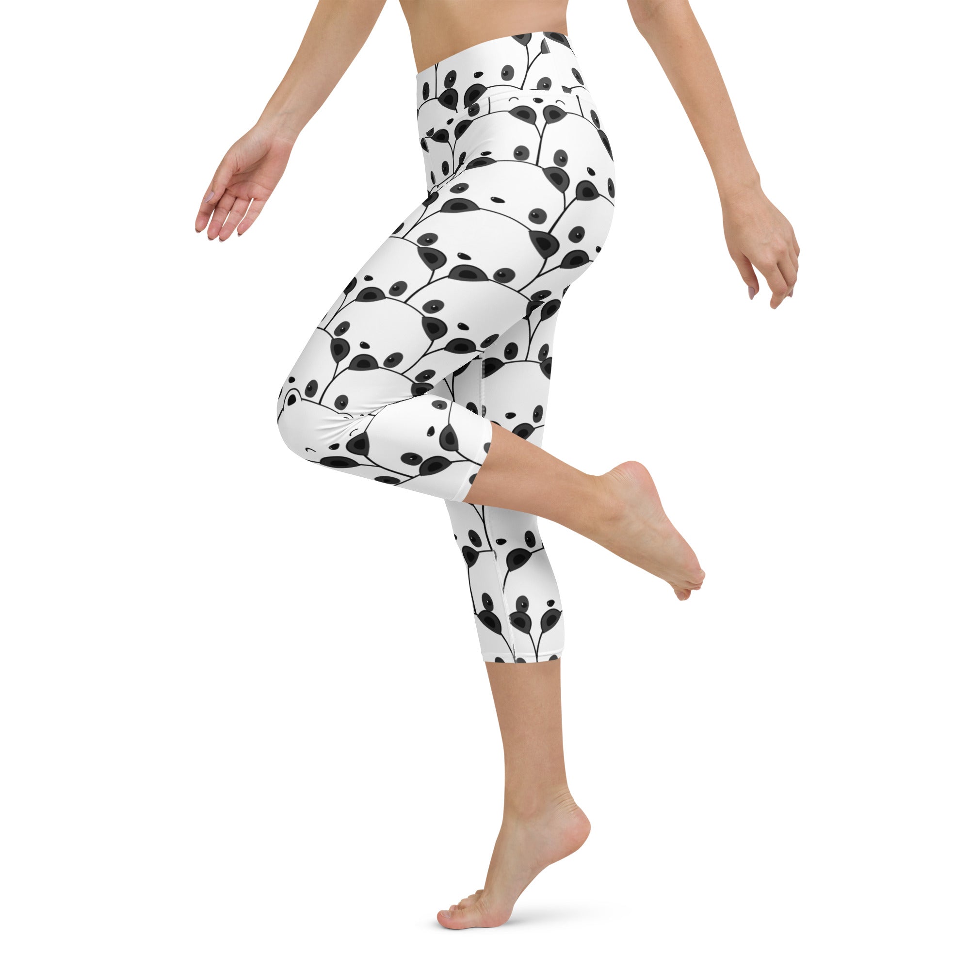 White capri leggings with black panda and leaf pattern high-rise moisture-wicking soft stretch activewear pants