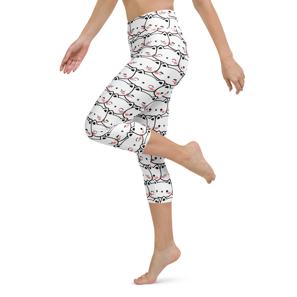 White capri leggings with black outlined cartoon cats and pink blush cheeks high-rise buttery soft yoga pants