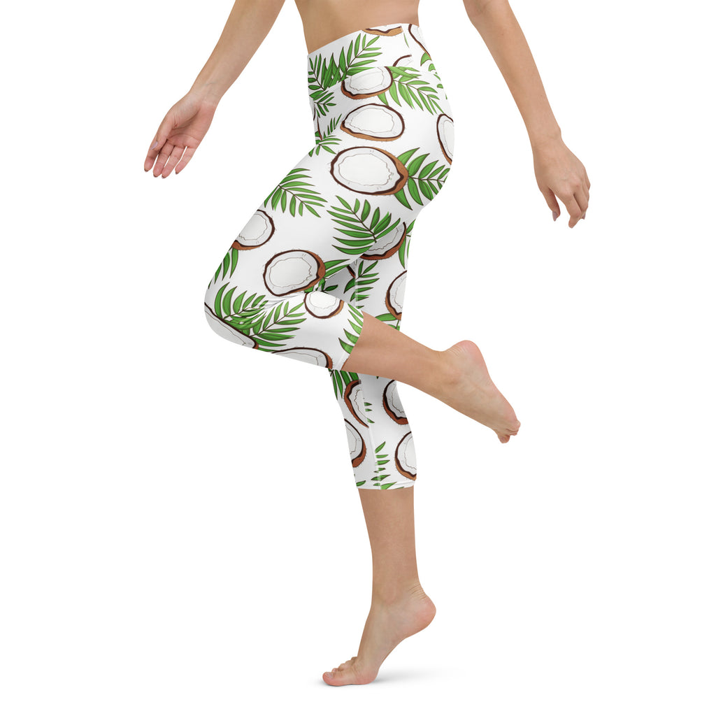 White capri leggings with a vibrant tropical green palm leaf and brown coconut pattern buttery soft and moisture-wicking