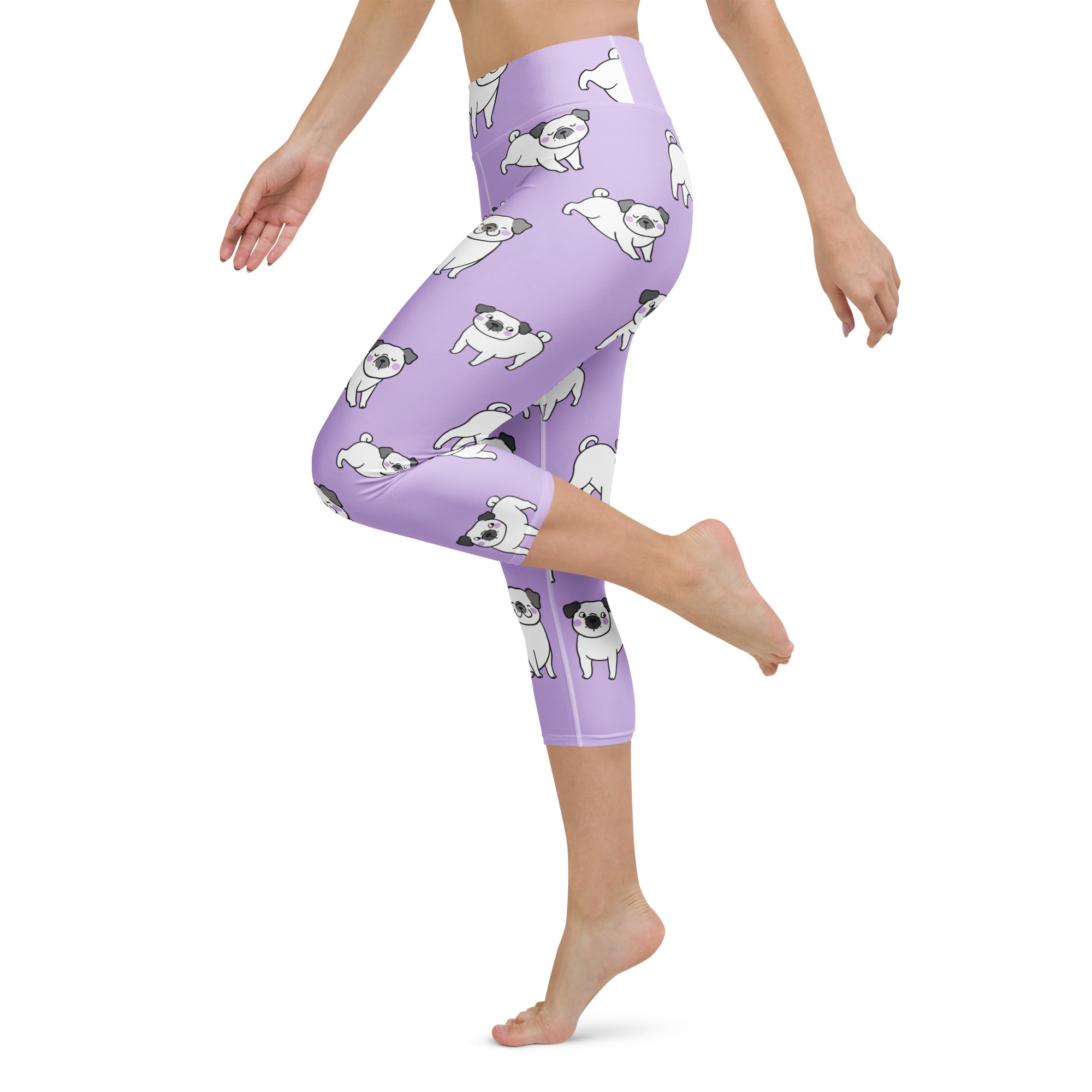 Women’s purple pug buttery soft high-rise yoga capri leggings with moisture-wicking lilac fabric and white cartoon pugs pattern