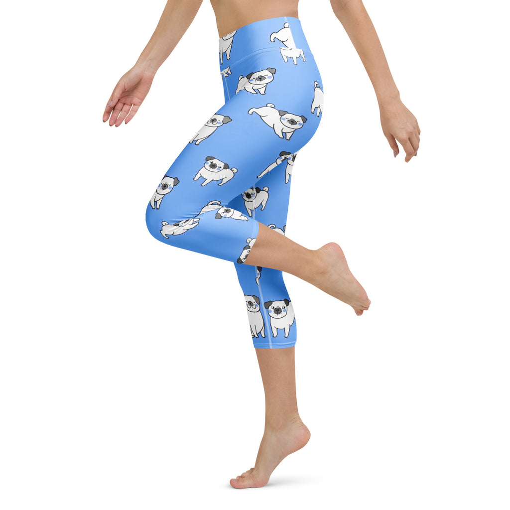 Women’s light blue pug buttery soft high-rise capri leggings with playful cartoon pug pattern and moisture-wicking fabric