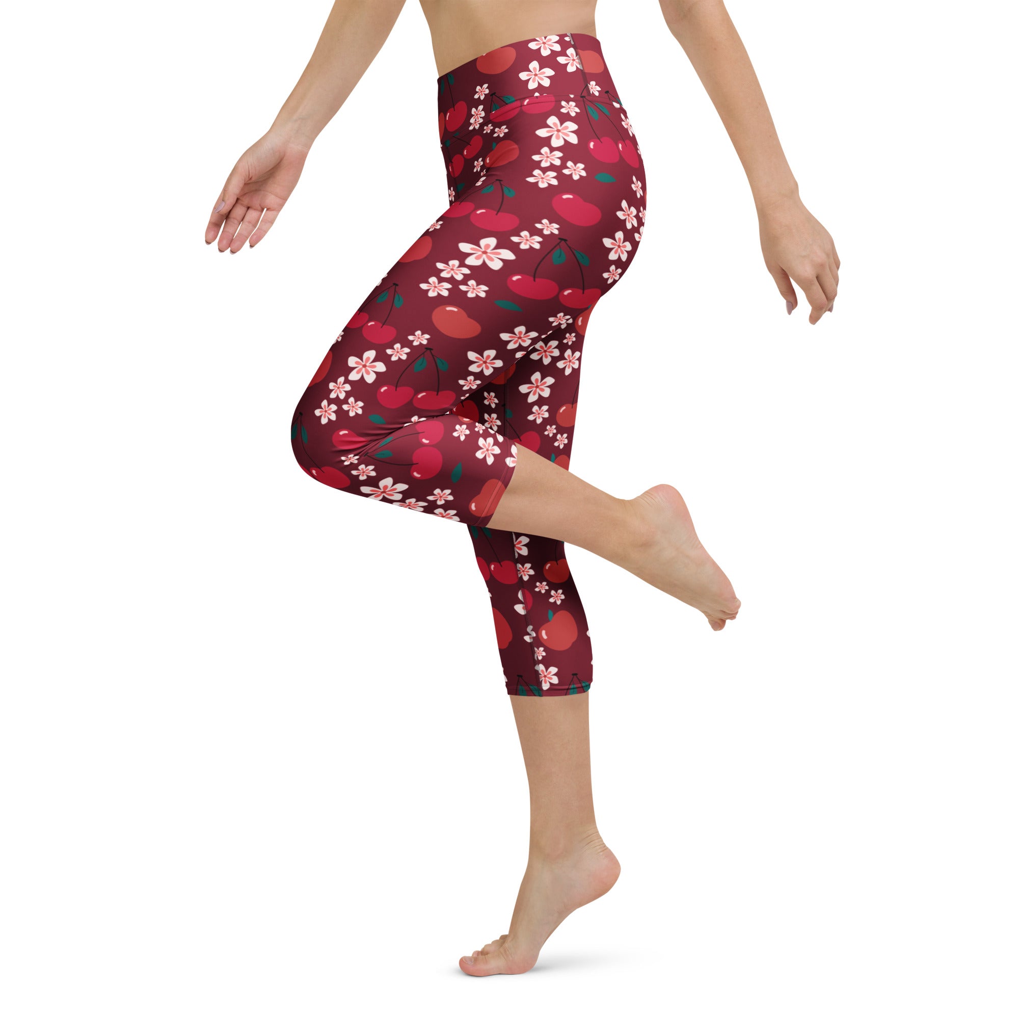 Women’s cherry blossom buttery soft high-rise capri leggings with red cherry and pink flower pattern for yoga and activewear