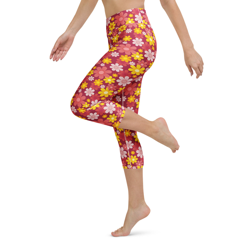 Women’s high-rise buttery soft yoga capri leggings in vibrant pink and yellow floral pattern with moisture-wicking fabric