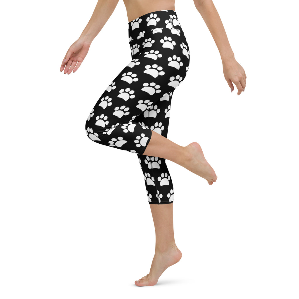 Women’s black high-rise capri leggings with white paw prints buttery soft moisture-wicking stretch fabric