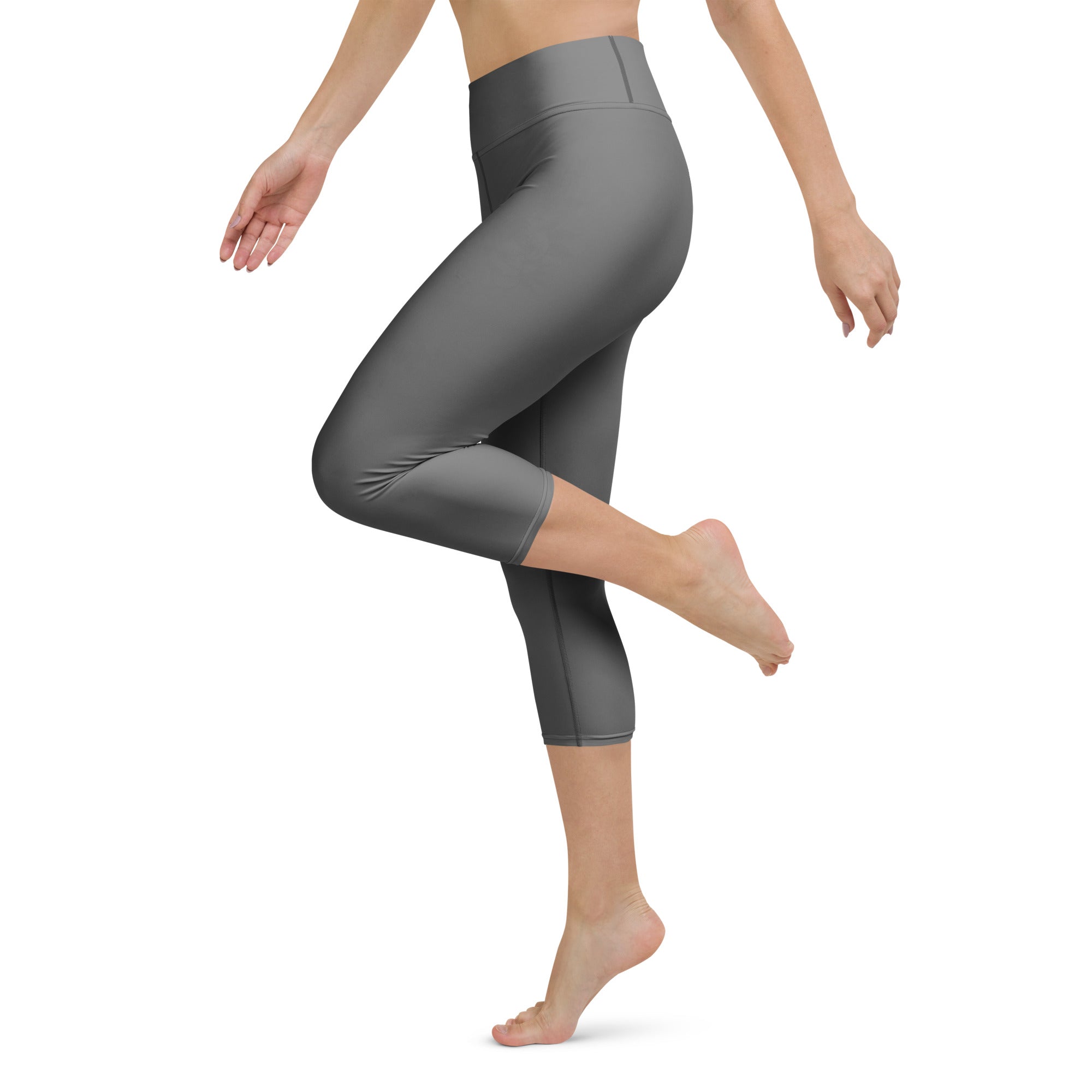 Women’s gray buttery soft high rise yoga capri leggings made of smooth stretchy moisture wicking fabric