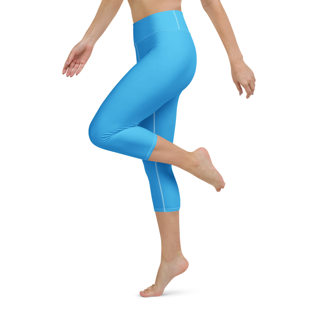 Women’s sky blue high-rise buttery soft yoga capri leggings with moisture-wicking fabric and white side seams