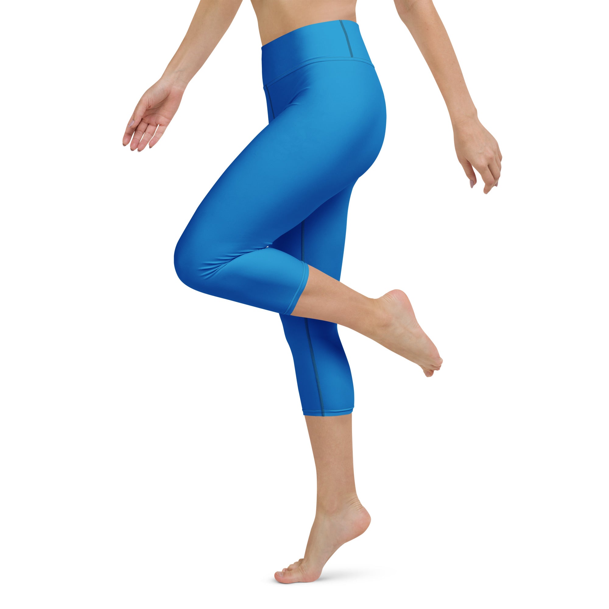 Women’s royal blue high-rise buttery soft yoga capri leggings with smooth stretchy fabric and moisture-wicking design