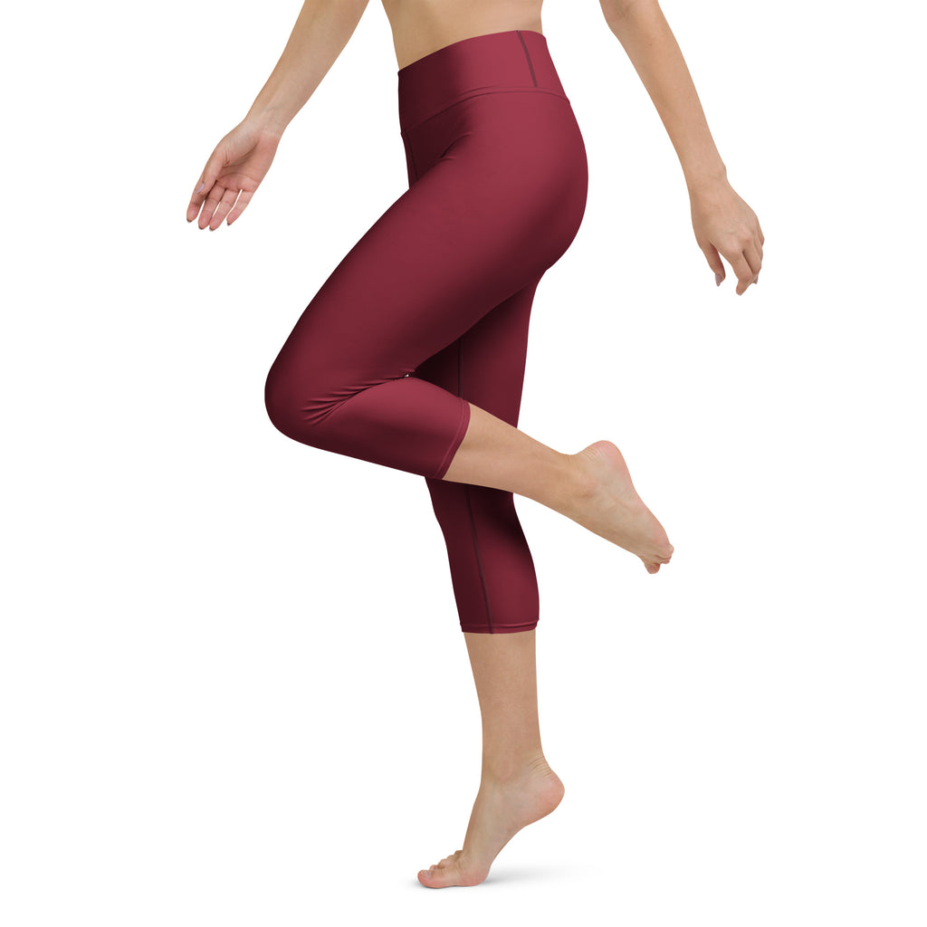 Women’s burgundy buttery soft high-rise yoga capri leggings with smooth stretchy moisture-wicking fabric