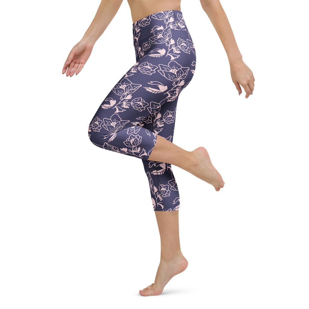 Women’s purple floral buttery soft high-rise yoga capri leggings with delicate pink and white outlines pattern