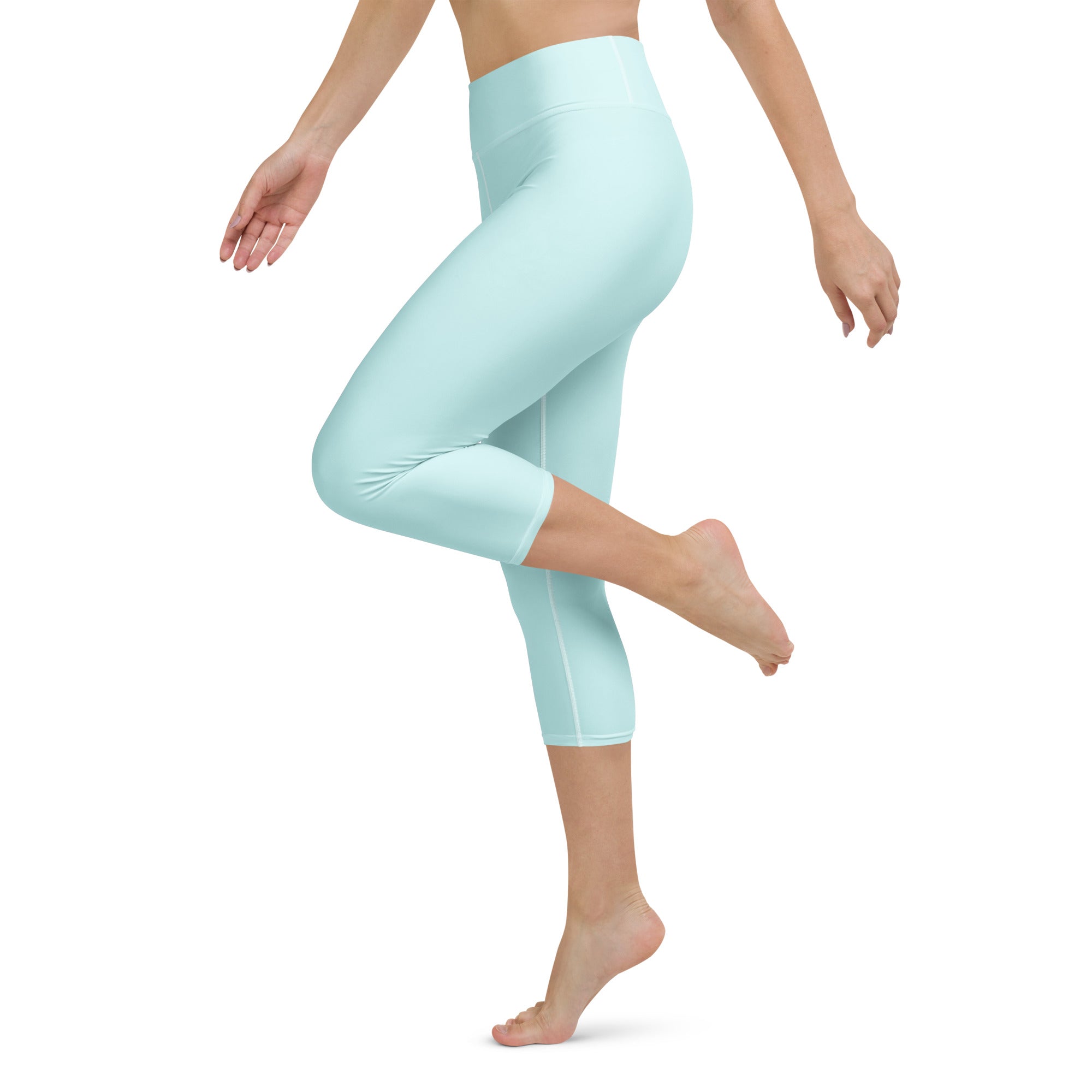 Light blue capri leggings with high-rise waistband and soft stretchy fabric for moisture-wicking yoga wear