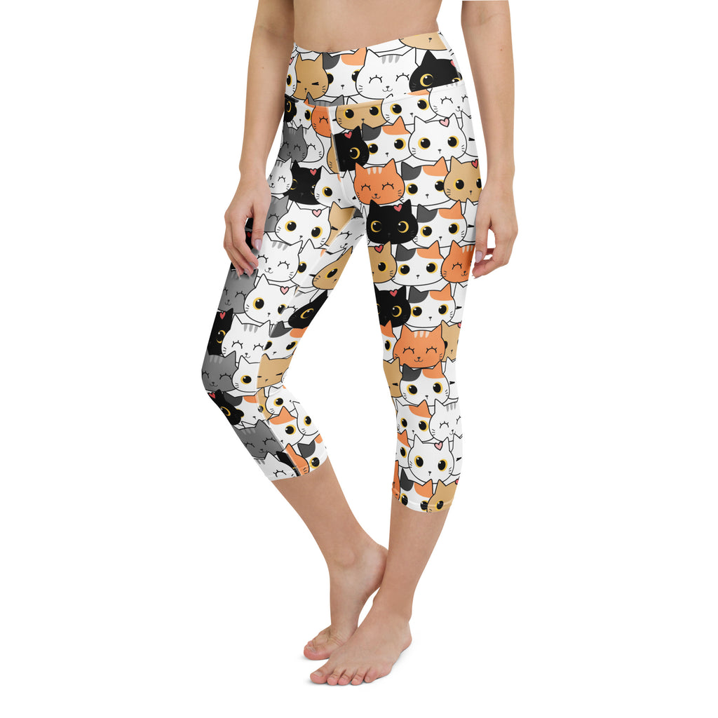 White high-rise buttery soft capri leggings with colorful cartoon cat faces moisture-wicking stretch activewear