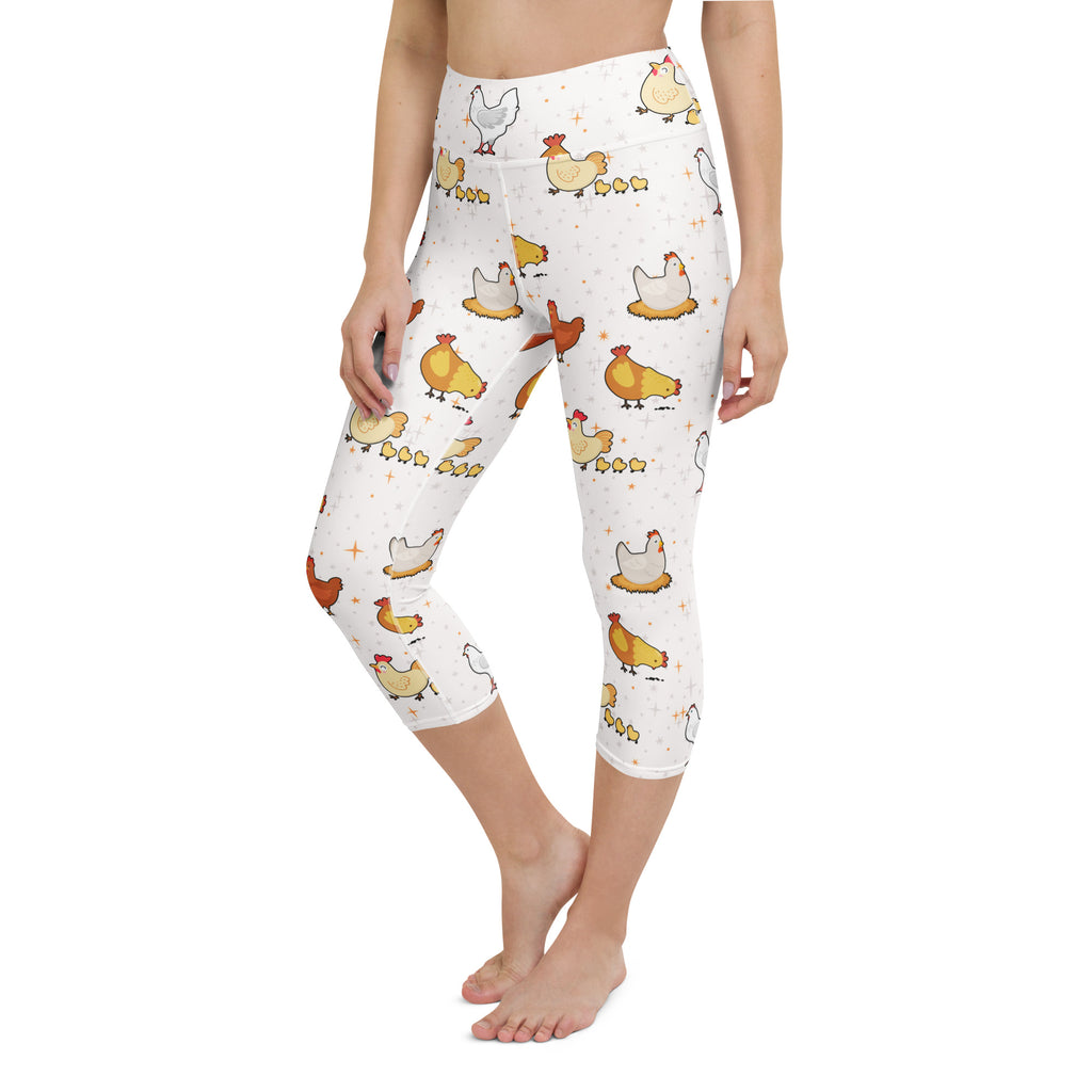White capri leggings with high rise moisture wicking buttery soft fabric featuring cartoon chickens and chicks pattern
