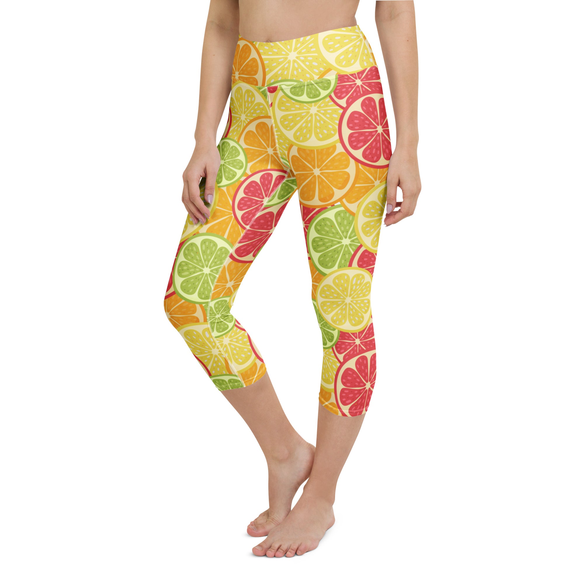 Women’s high-rise buttery soft capri leggings with vibrant citrus fruit slices pattern in yellow orange green and red