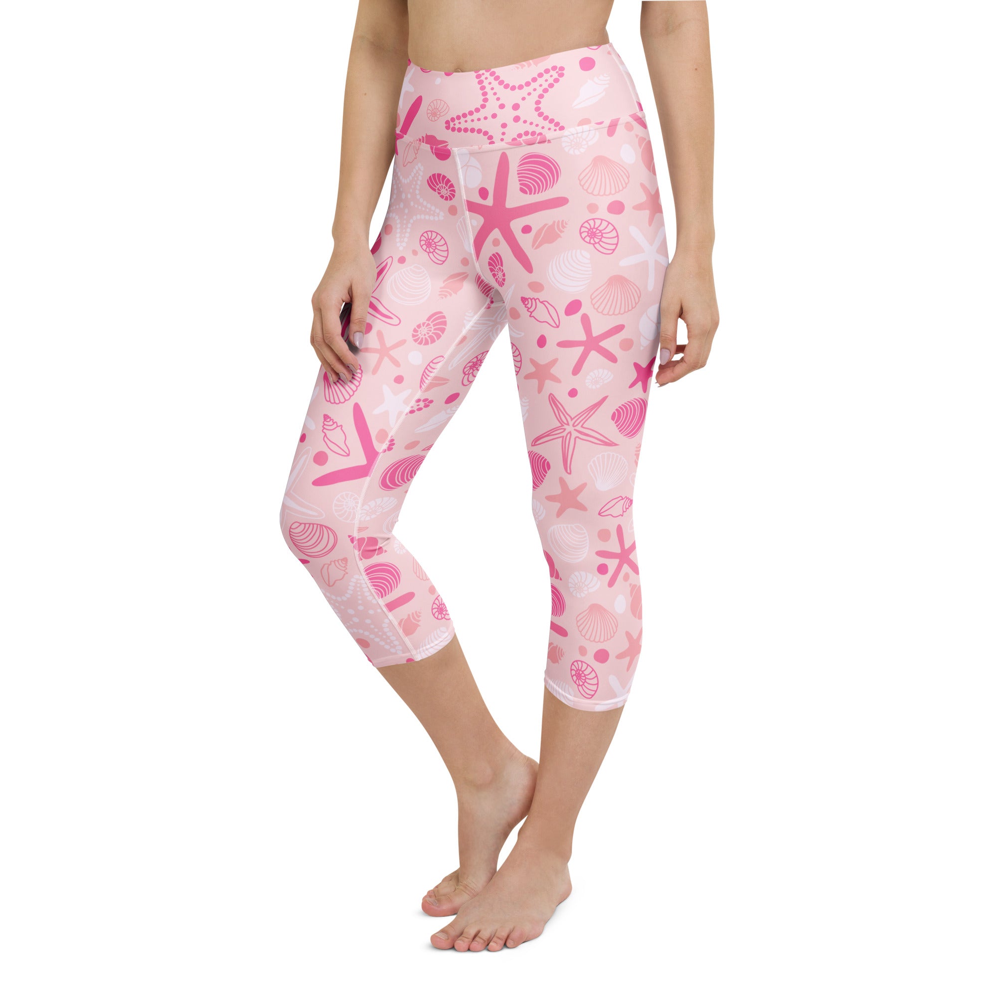 Women’s pink starfish and seashell patterned buttery soft high-rise capri leggings for yoga and activewear