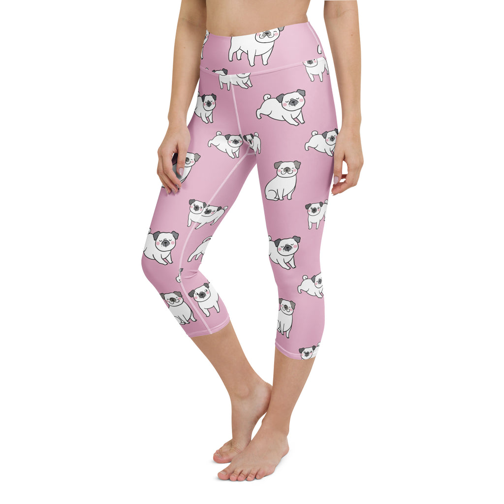 Women’s pink high-rise capri leggings with white pug pattern made from buttery soft moisture-wicking fabric