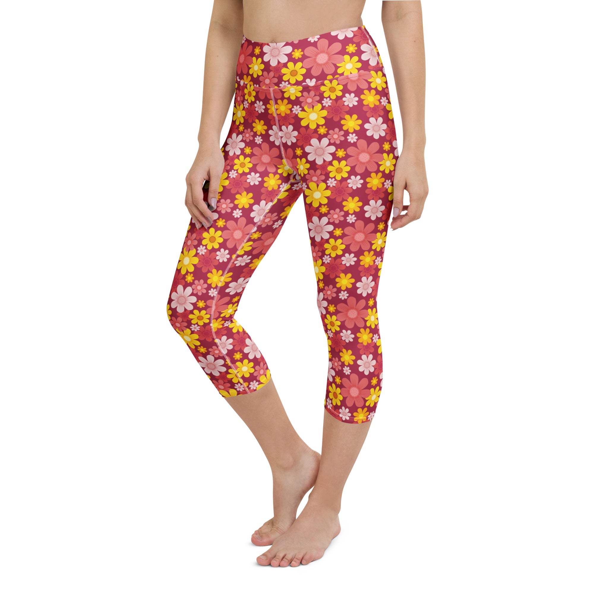 Women’s red floral buttery soft high-rise yoga capri leggings in pink and yellow floral pattern with moisture-wicking fabric