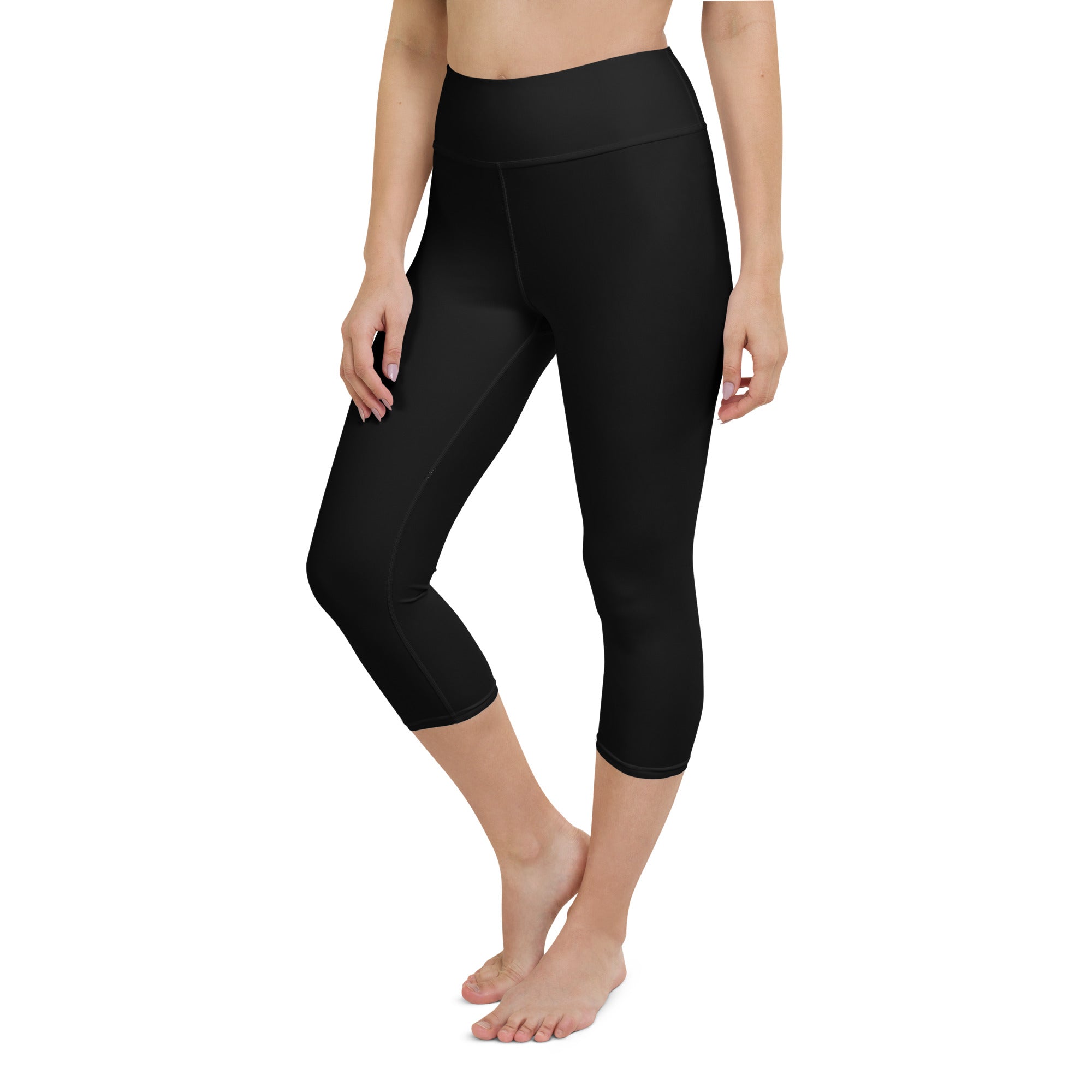 Black high-waisted buttery soft yoga capri leggings with smooth stretchy fabric for moisture-wicking comfort