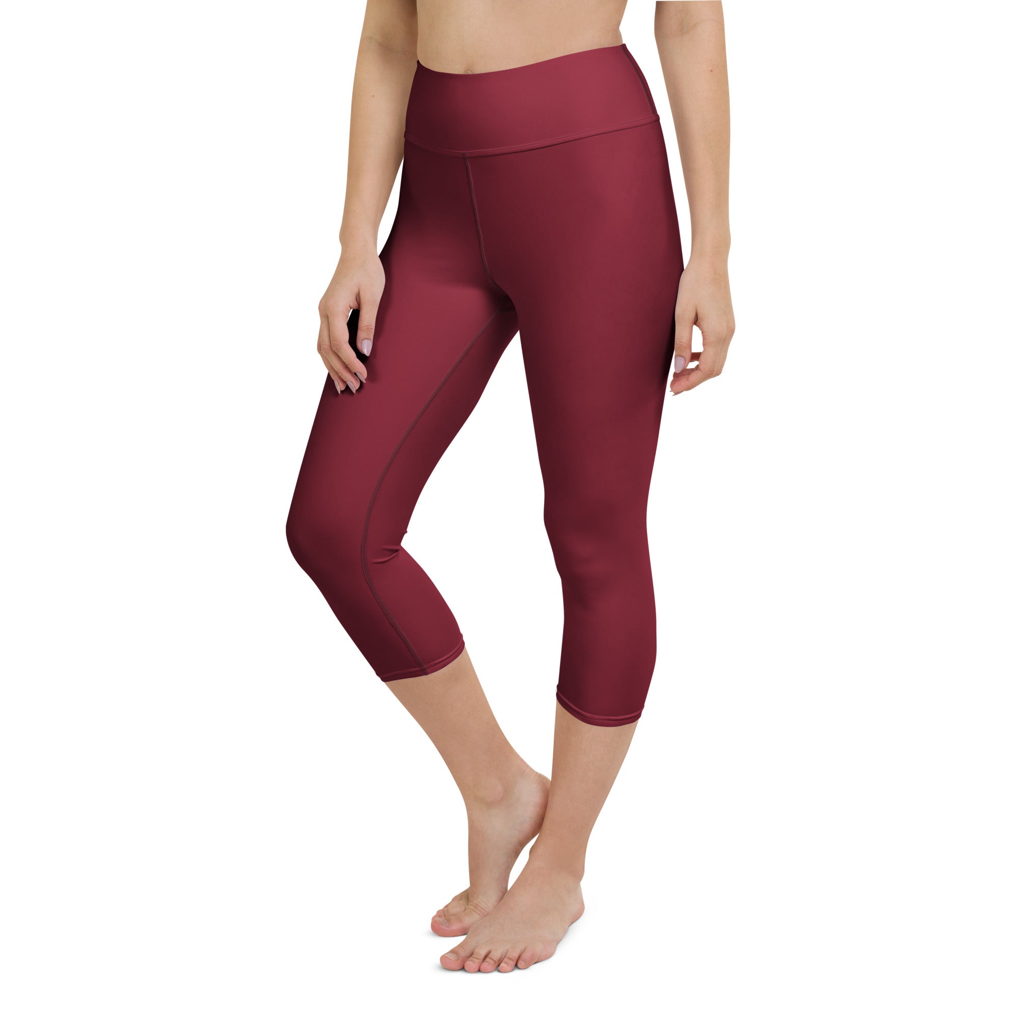 Women’s burgundy high-rise yoga capri leggings made of buttery soft stretchy moisture-wicking fabric
