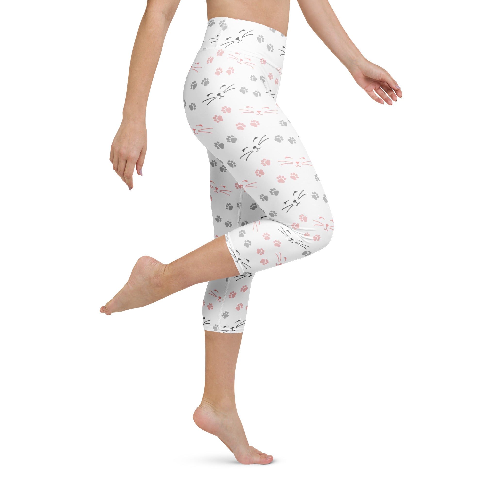 White capri leggings with pink and gray cat faces whiskers and paw prints buttery soft moisture-wicking activewear