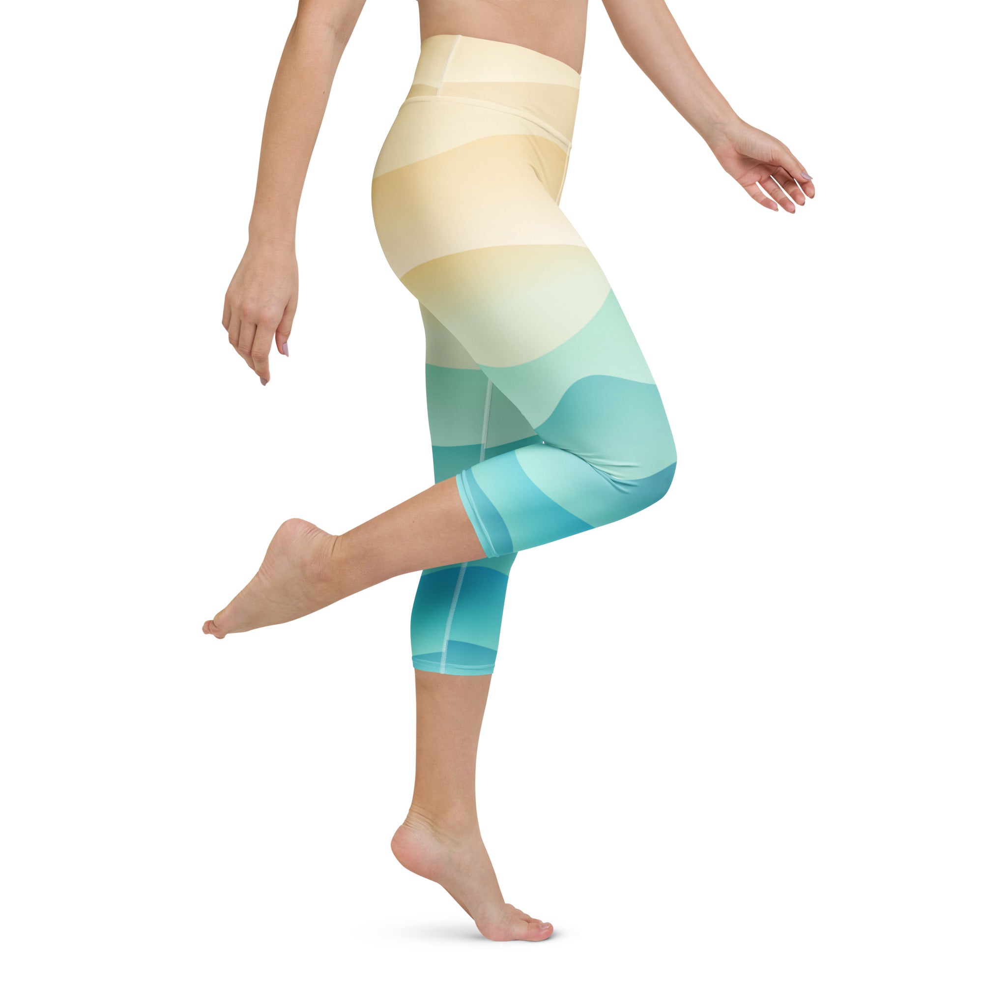 Women’s coastal gradient buttery soft yoga capri leggings with high-rise fit and moisture-wicking wave pattern in yellow and blue