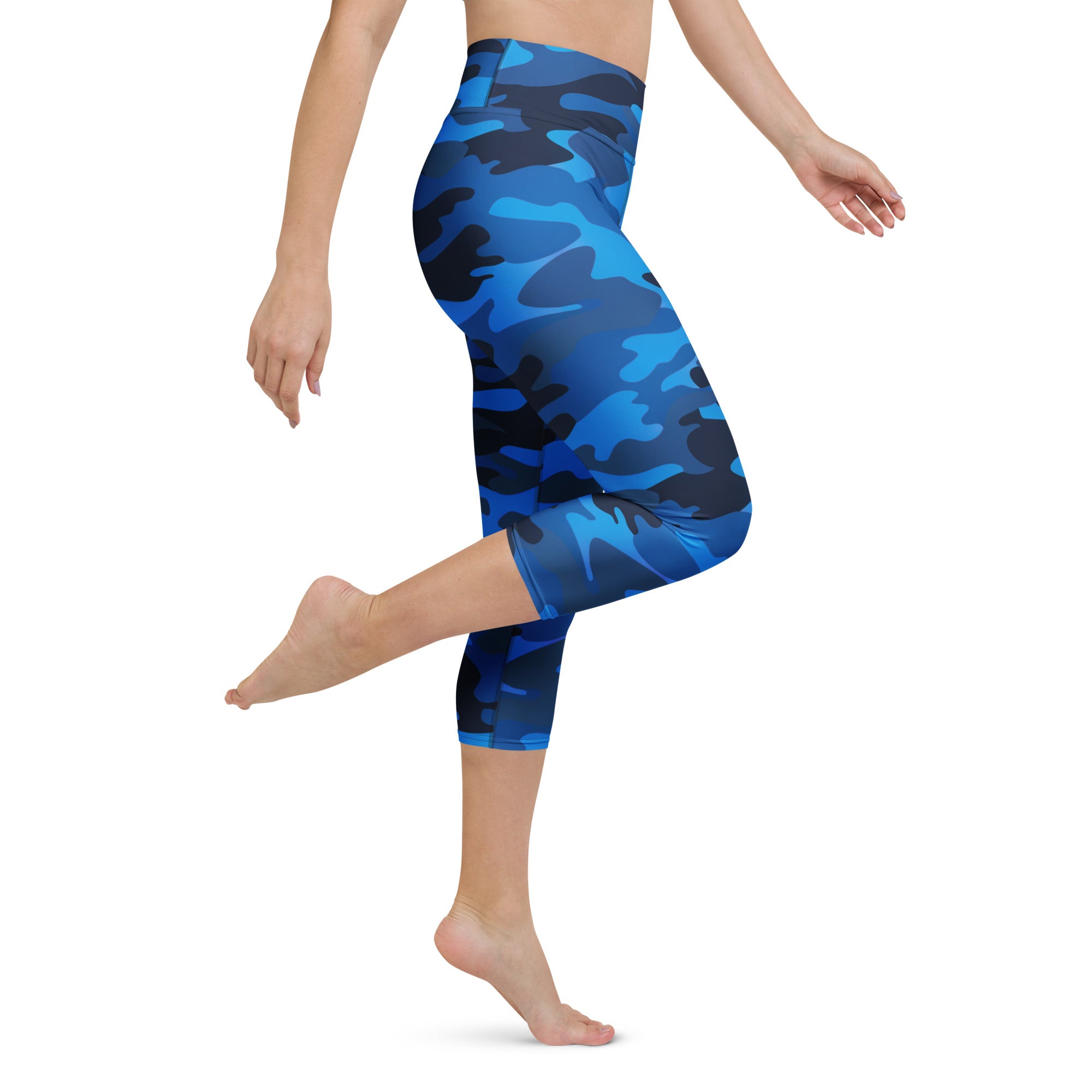 Women’s blue and black camouflage high-rise capri leggings made of buttery soft moisture-wicking stretch fabric