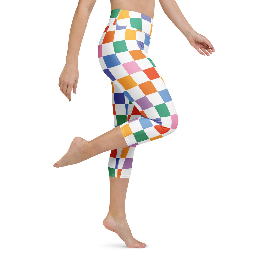 Women’s colorful checkered buttery soft high-rise yoga capri leggings with vibrant rainbow pattern on stretchy fabric